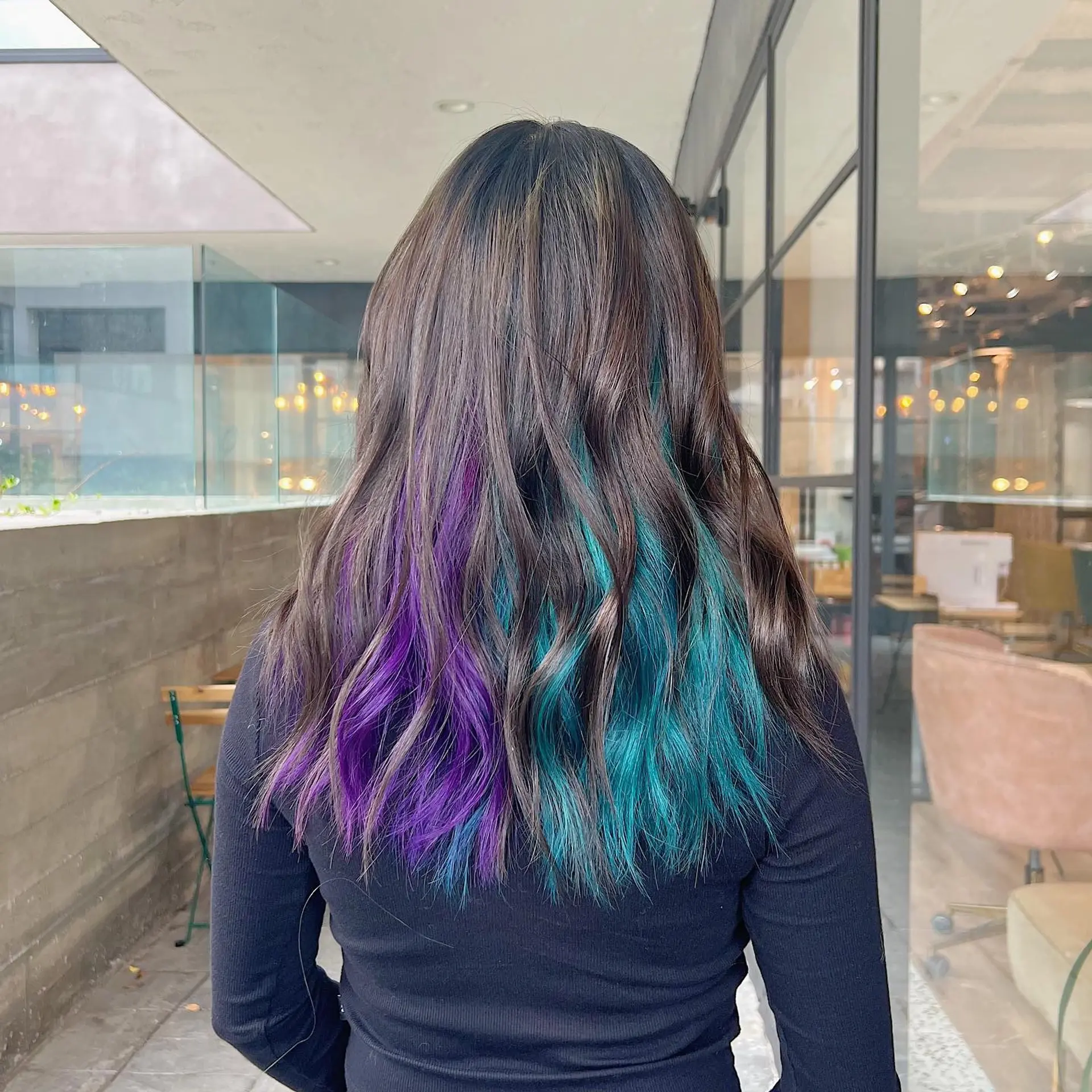 Long wavy hair with a dip dye effect in purple and teal. 1