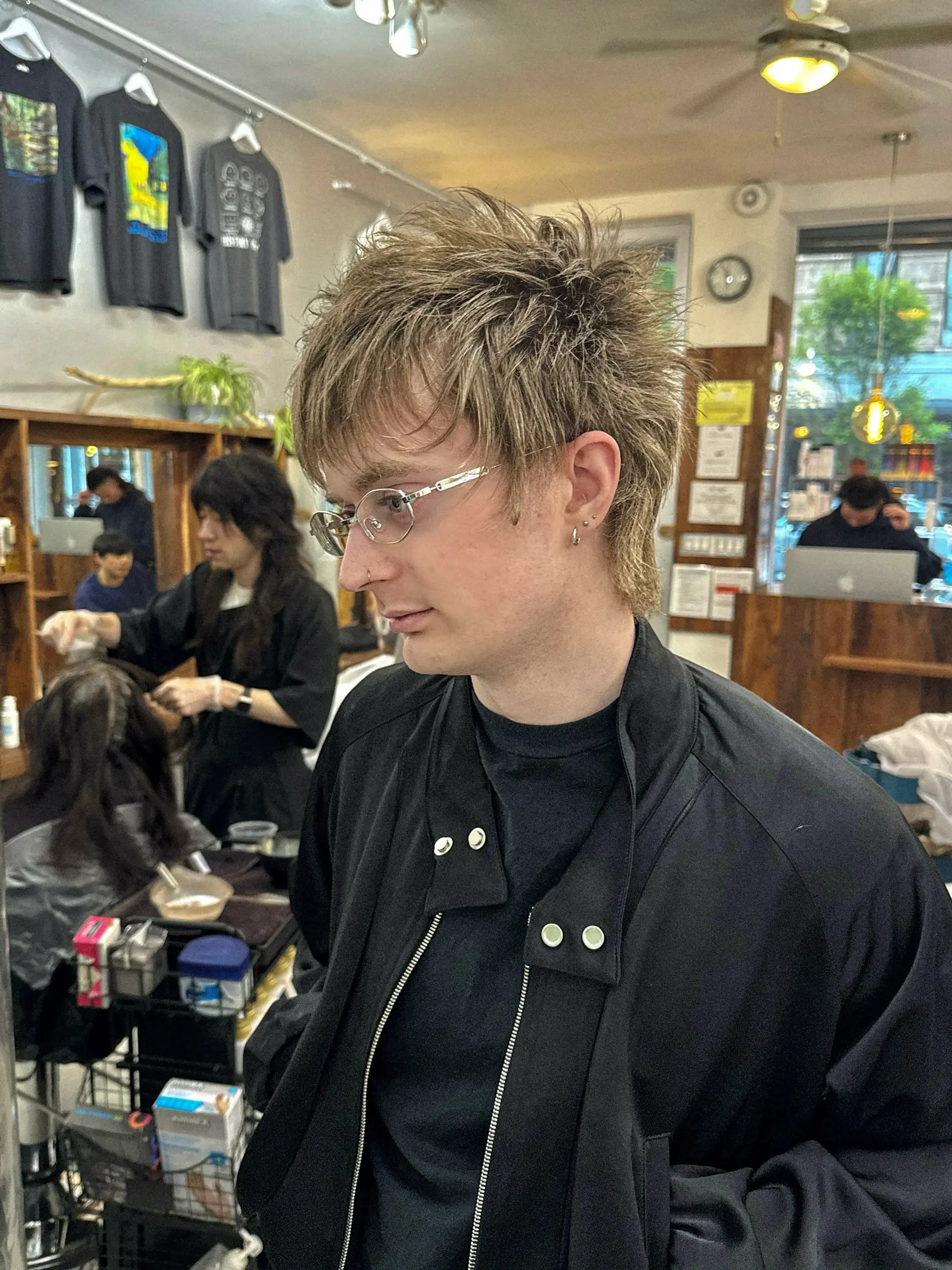 A shaggy, textured mullet with layered bangs. 3