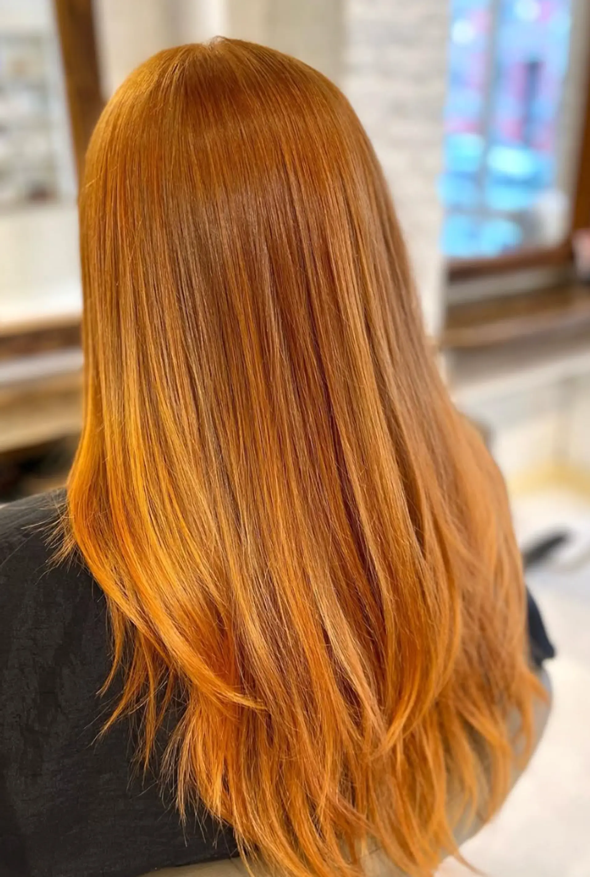Long, straight copper hair with a vibrant, fiery hue, featuring a smooth and lustrous texture. 1