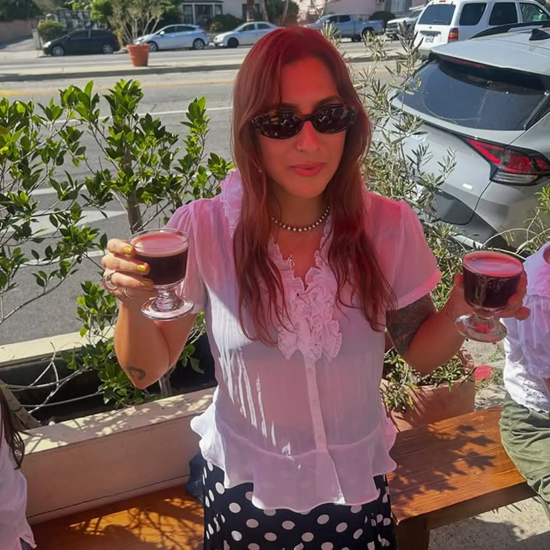 Long, wavy copper hair with face-framing layers and subtle balayage. 1