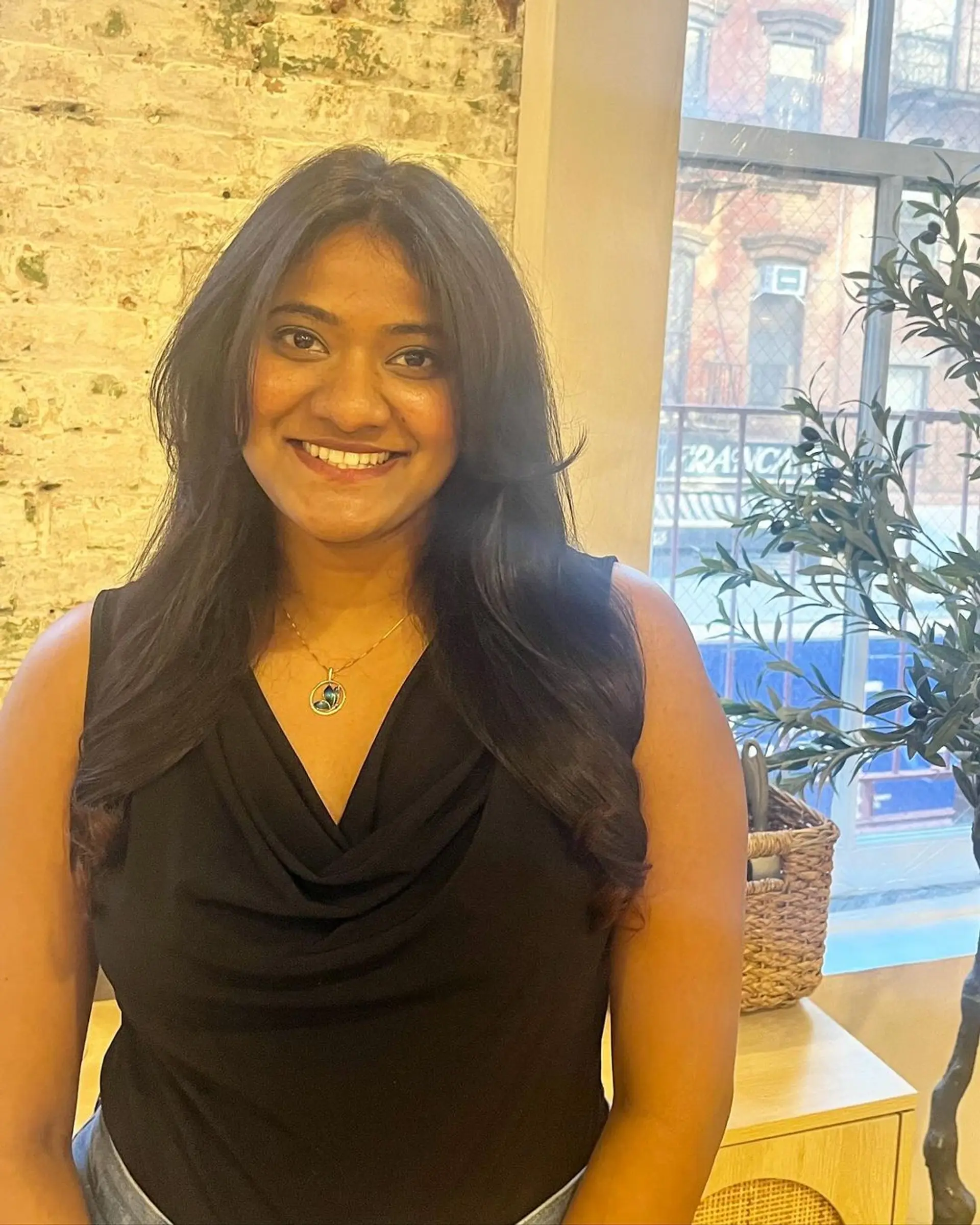 Long, sleek, straight black hair with a side parting and soft waves towards the ends, presenting a smooth and shiny finish. 2