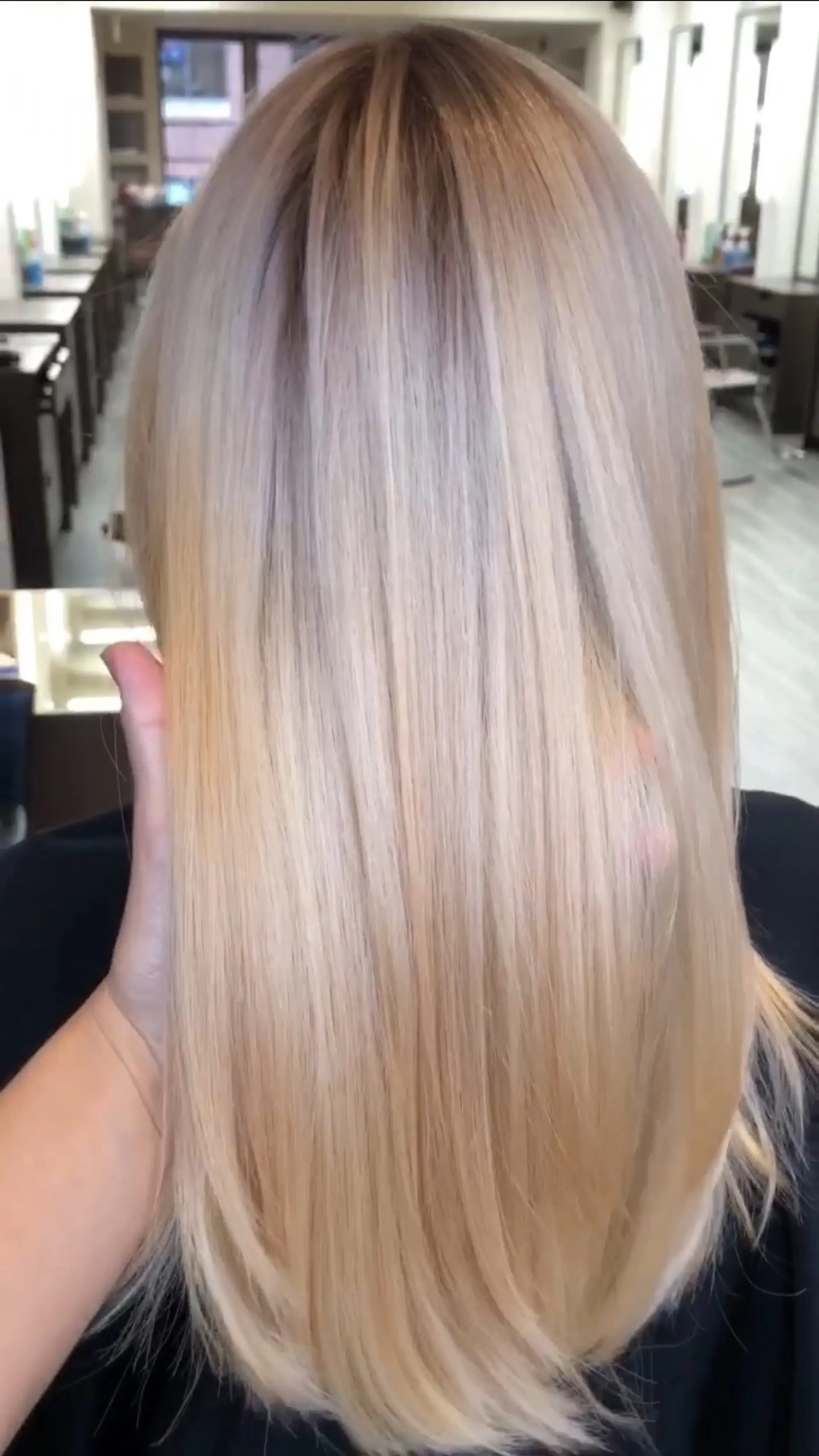 Straight, smooth long hair featuring a seamless warm light blonde color melt with subtle dimensional undertones. 1
