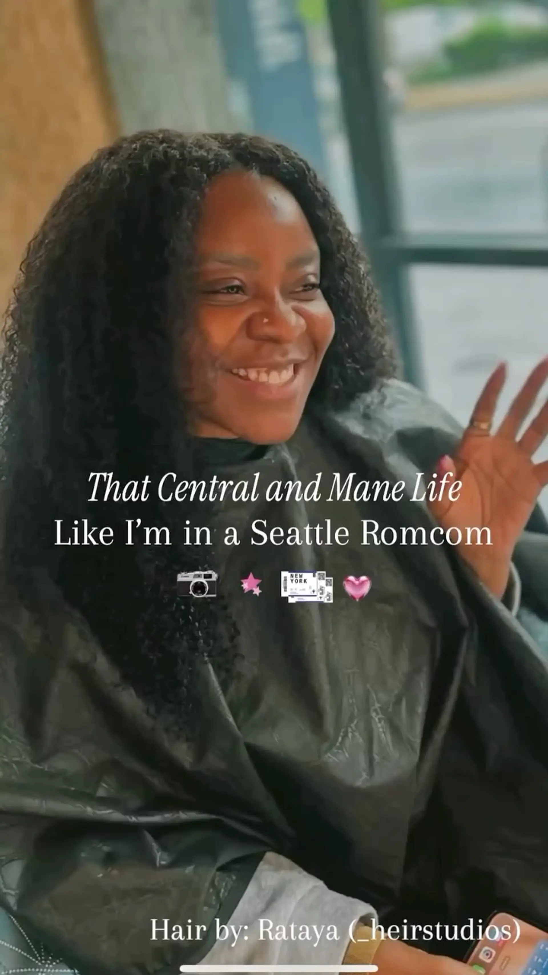 Long, voluminous dark hair with defined kinky curls cascading over the shoulders. 1