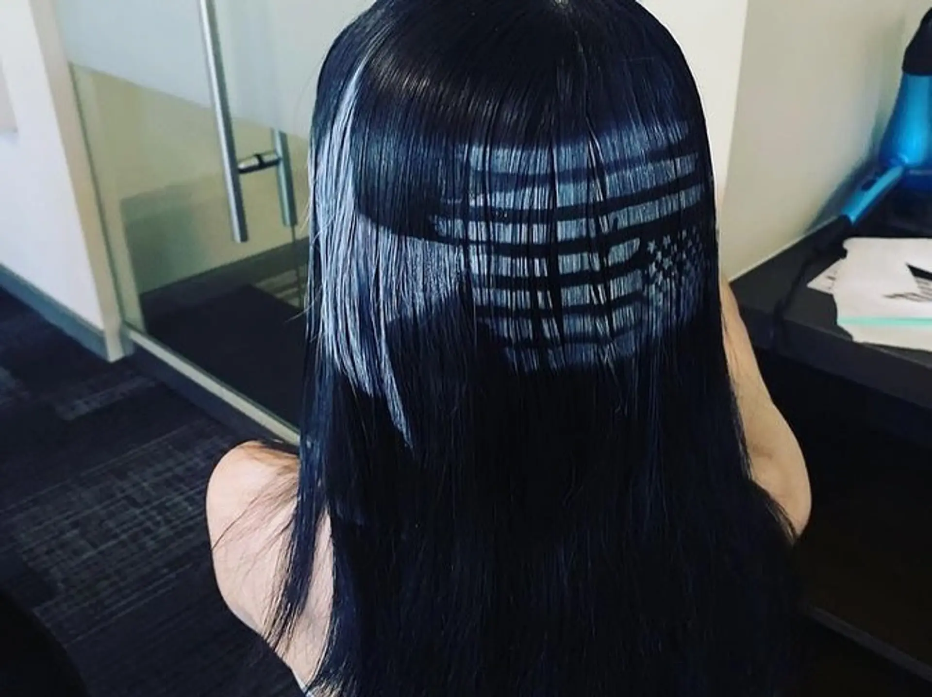 Straight jet-black hair featuring intricate graphic bleach stenciling in a flag pattern across the back and side. 1