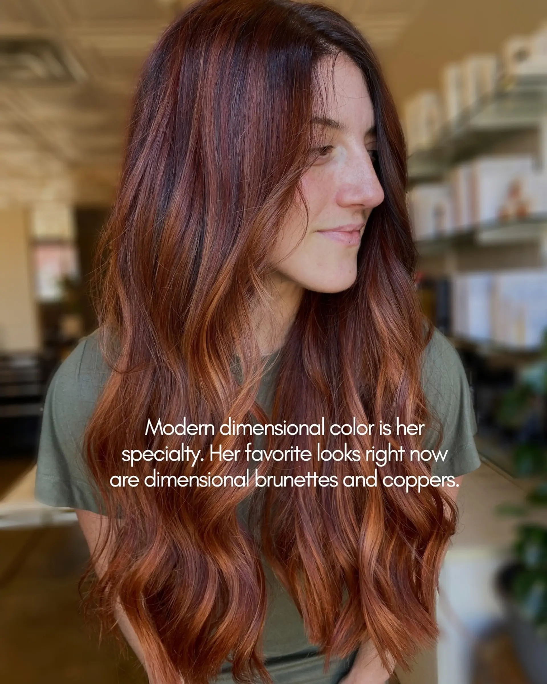 Long, flowing loose waves featuring a rich dimensional blend of warm copper and auburn tones over a brunette base. 1