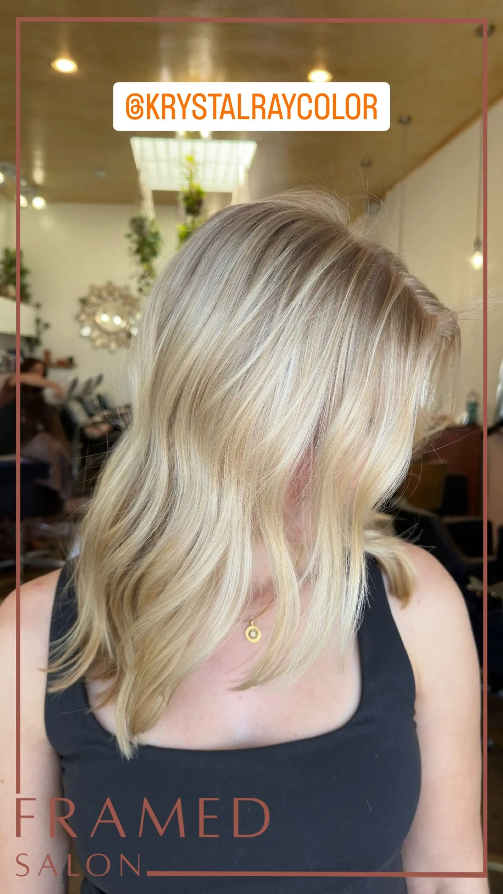 A gorgeous medium-length wavy hairstyle featuring a blended blonde balayage. 1
