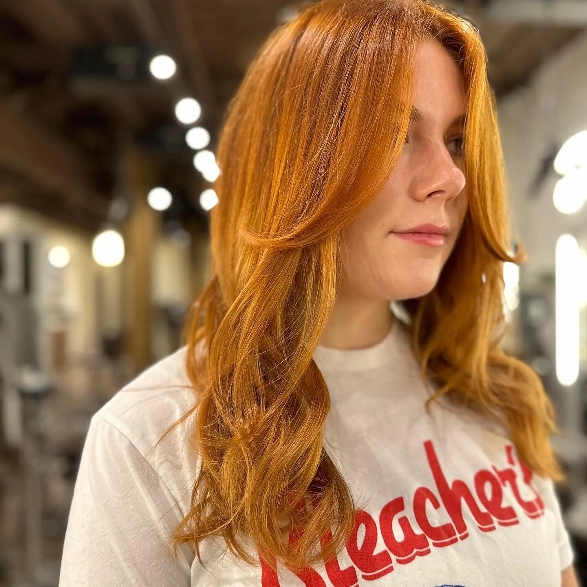 A medium-length layered cut with face-framing layers. 1