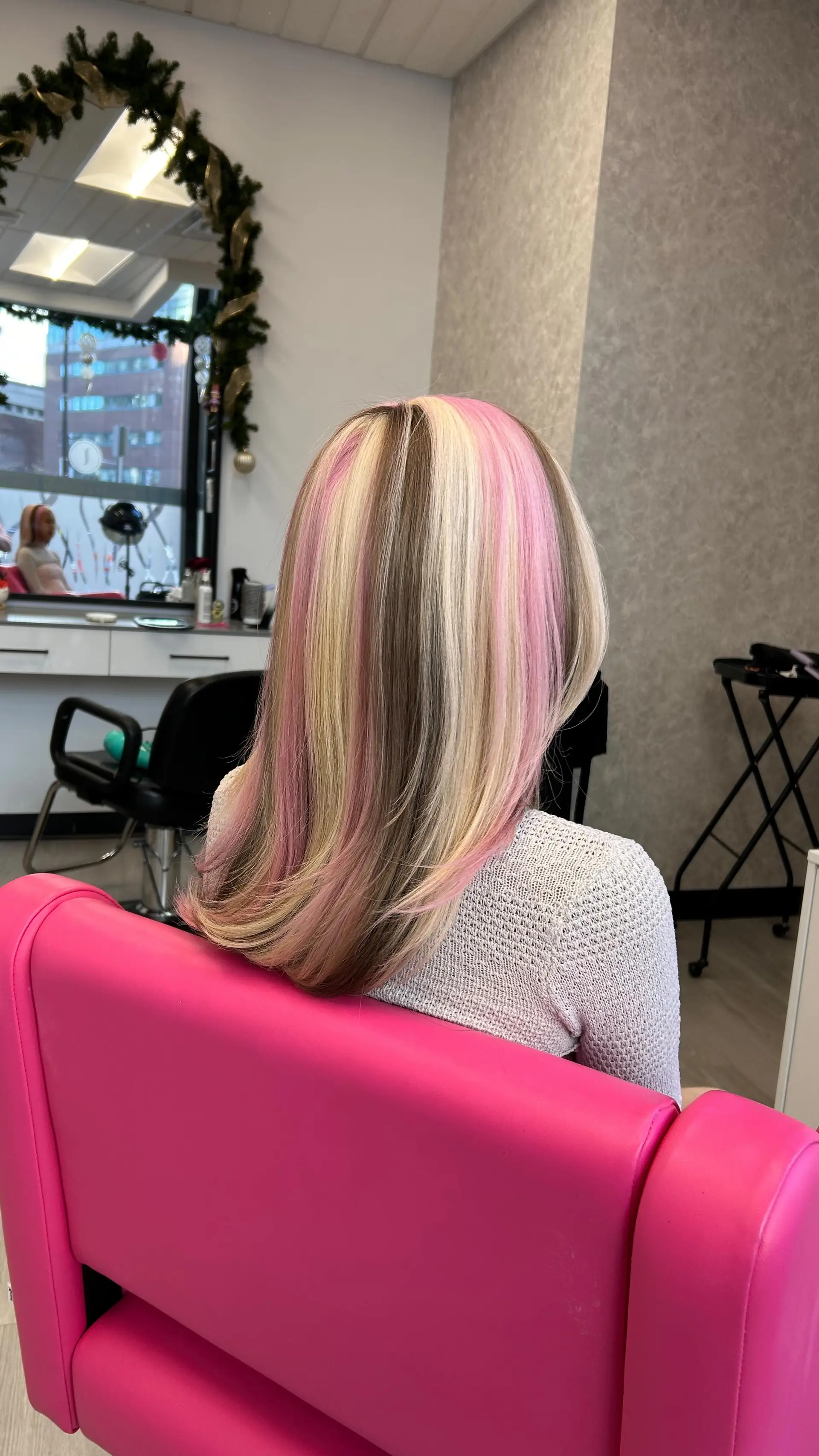 Sleek mid-length straight hair featuring vibrant Neapolitan-inspired color blocking with alternating stripes of pastel pink, cool blonde, and soft brown. 1