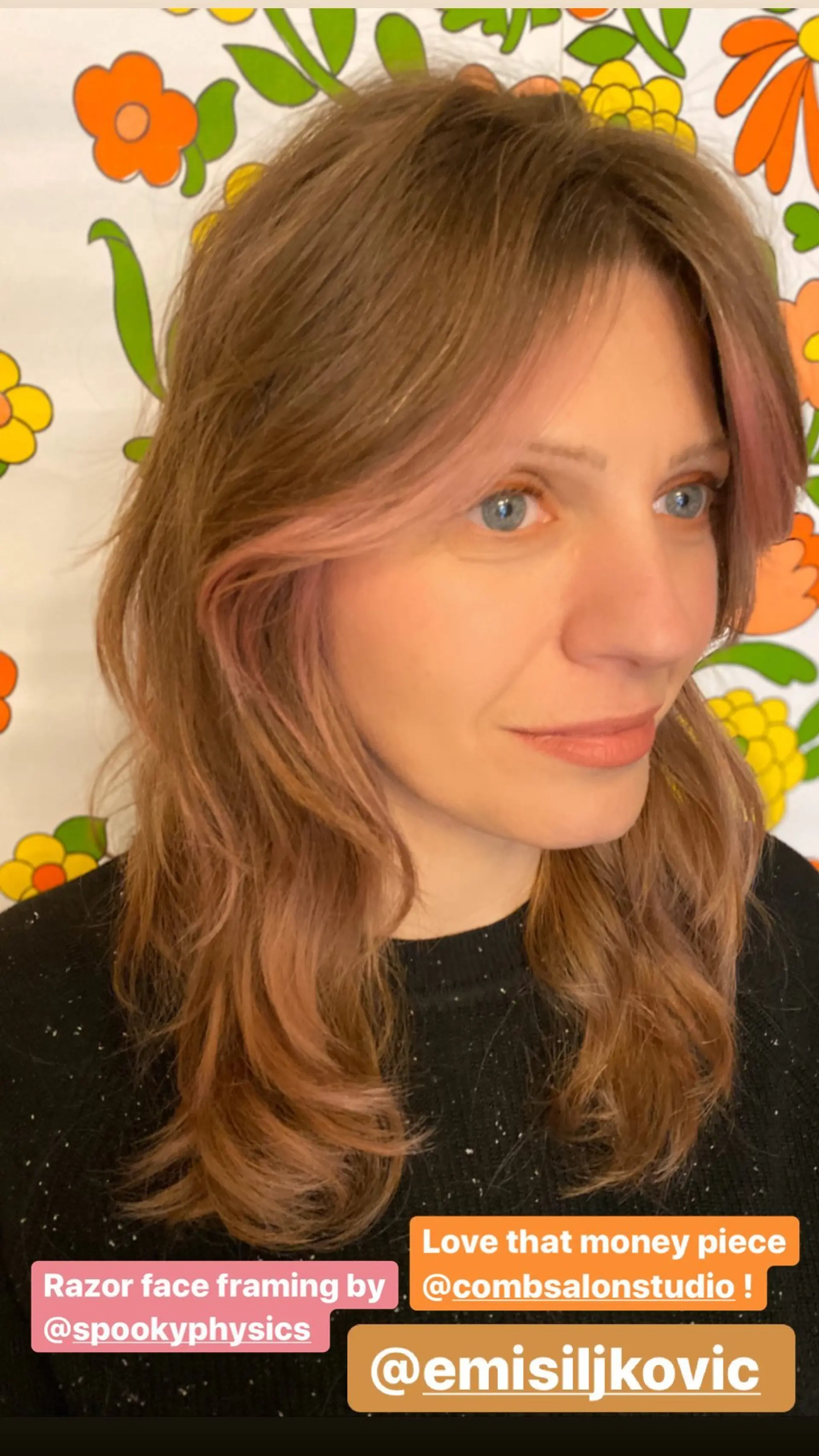 Wavy medium-length hairstyle with rose gold color, face-framing bangs, and textured layers. 1