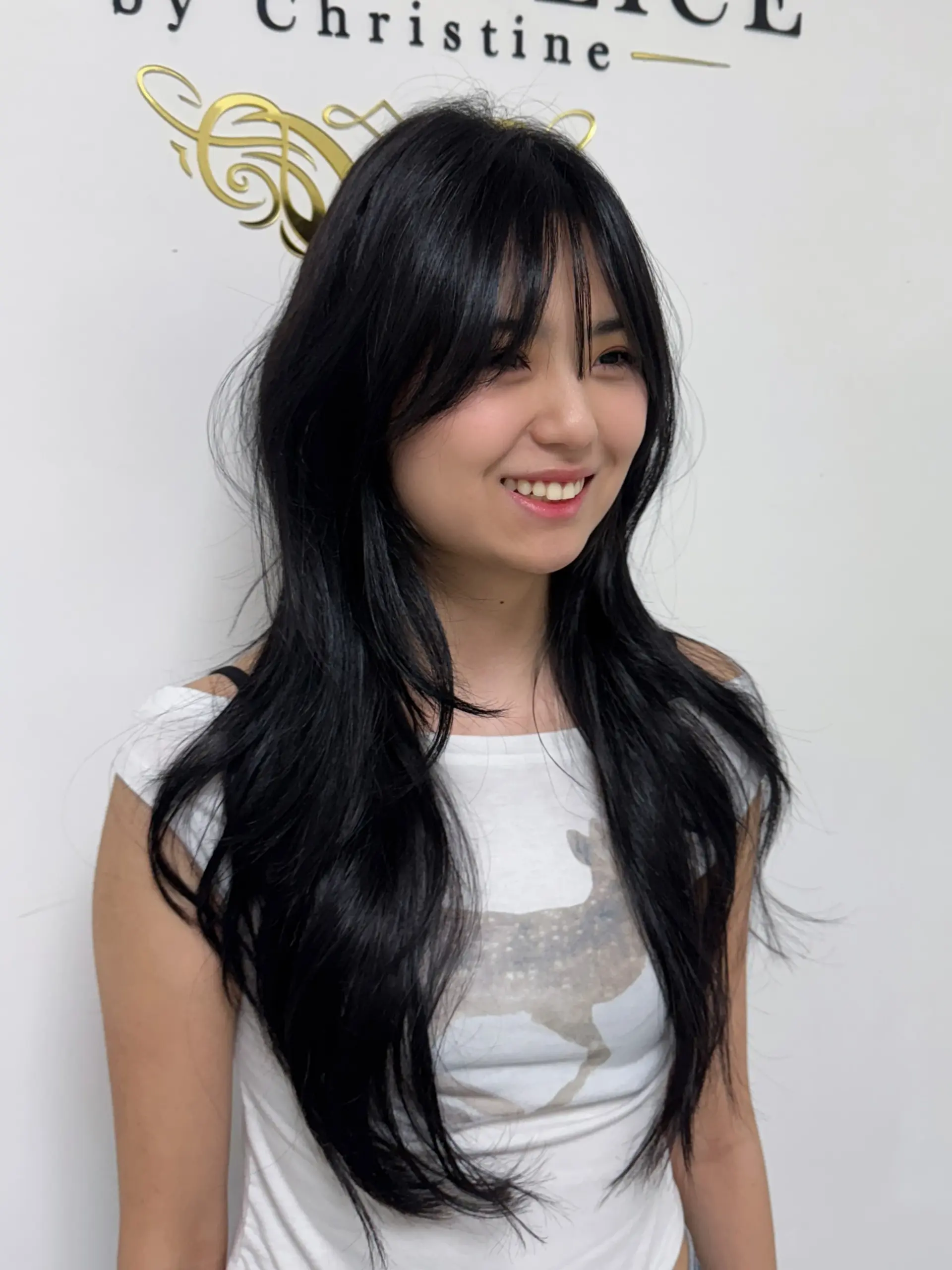 A trendy wolf cut with choppy layers and wispy bangs. 1