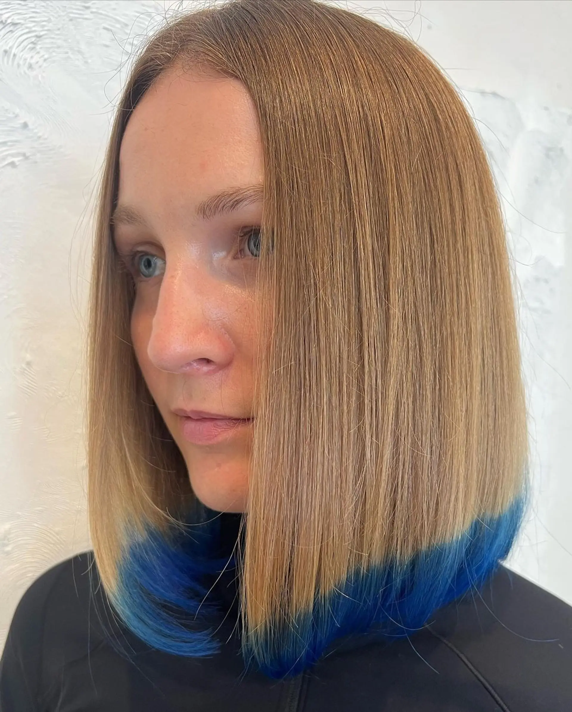 Straight, long bob with a blunt cut and a blue ombre effect at the ends. 1