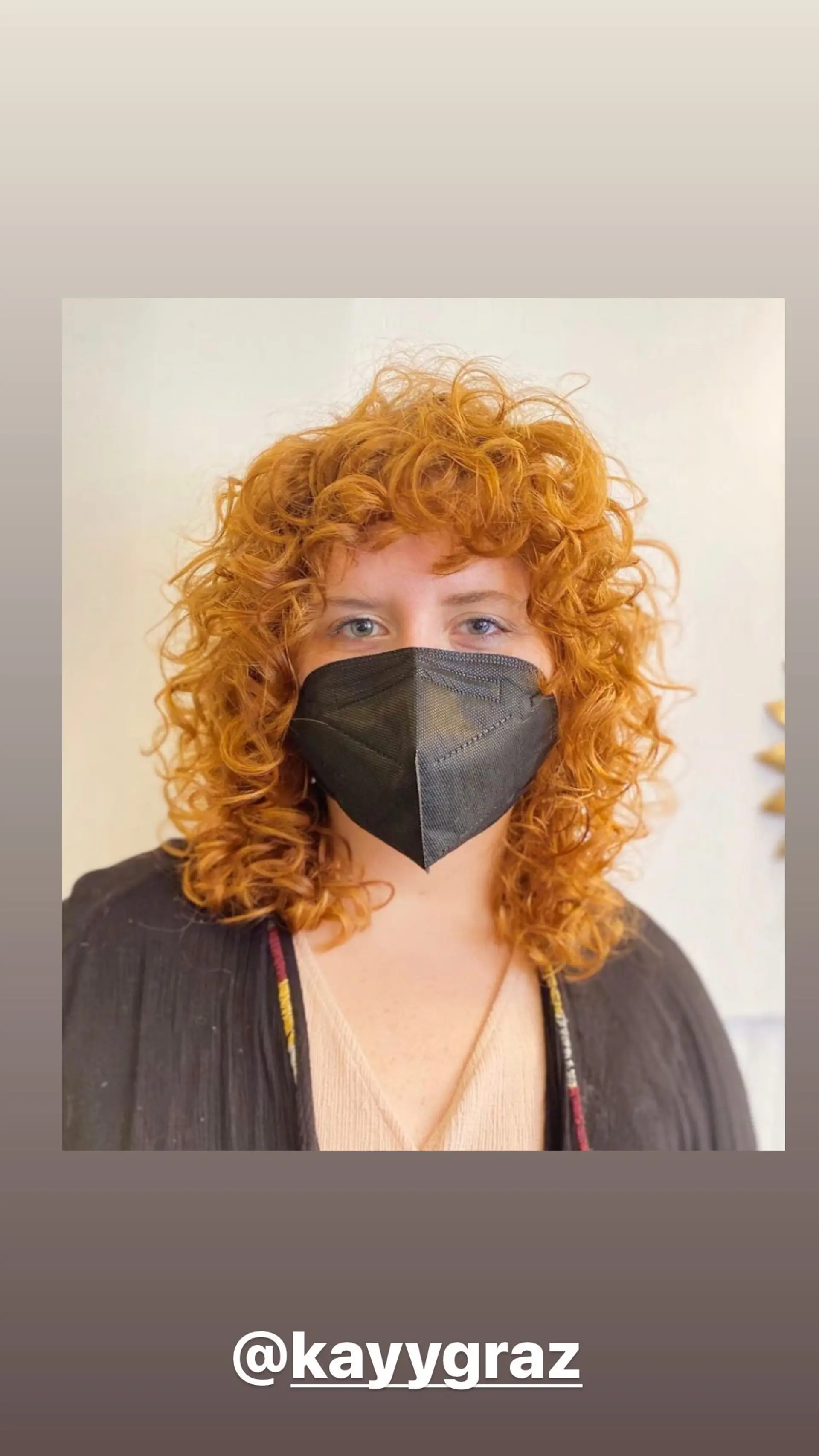 A trendy, voluminous curly shag with flattering bangs. 1