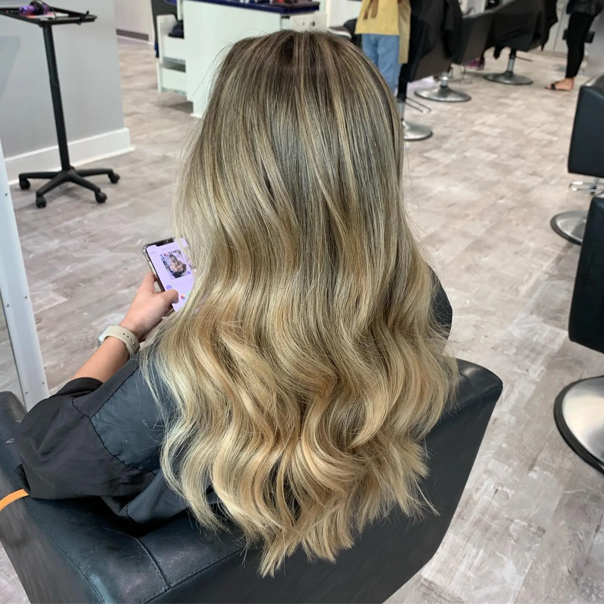 Long, flowing waves with a golden blonde balayage. 1