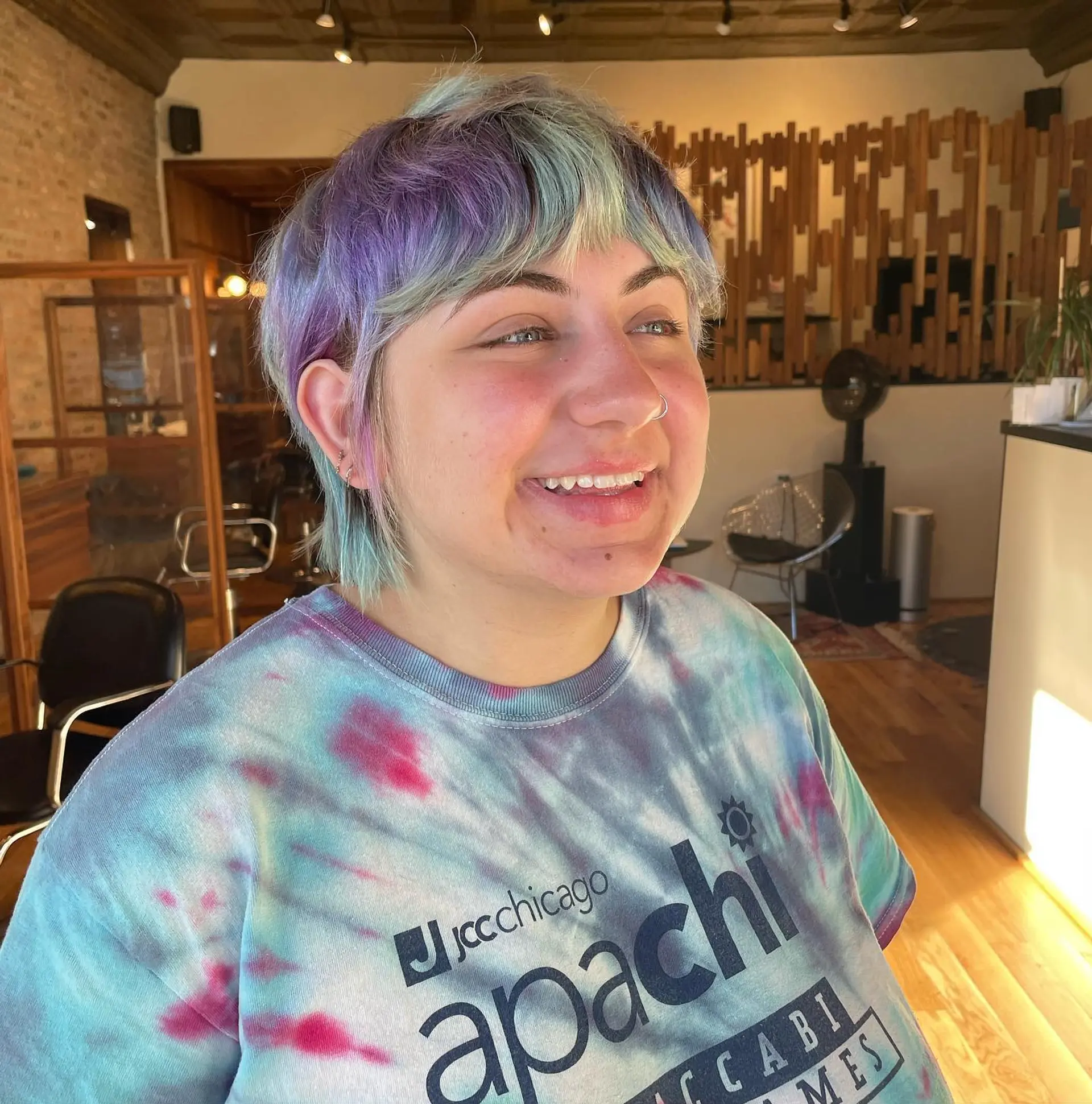 A trendy pixie cut with rainbow pastel coloring. 1
