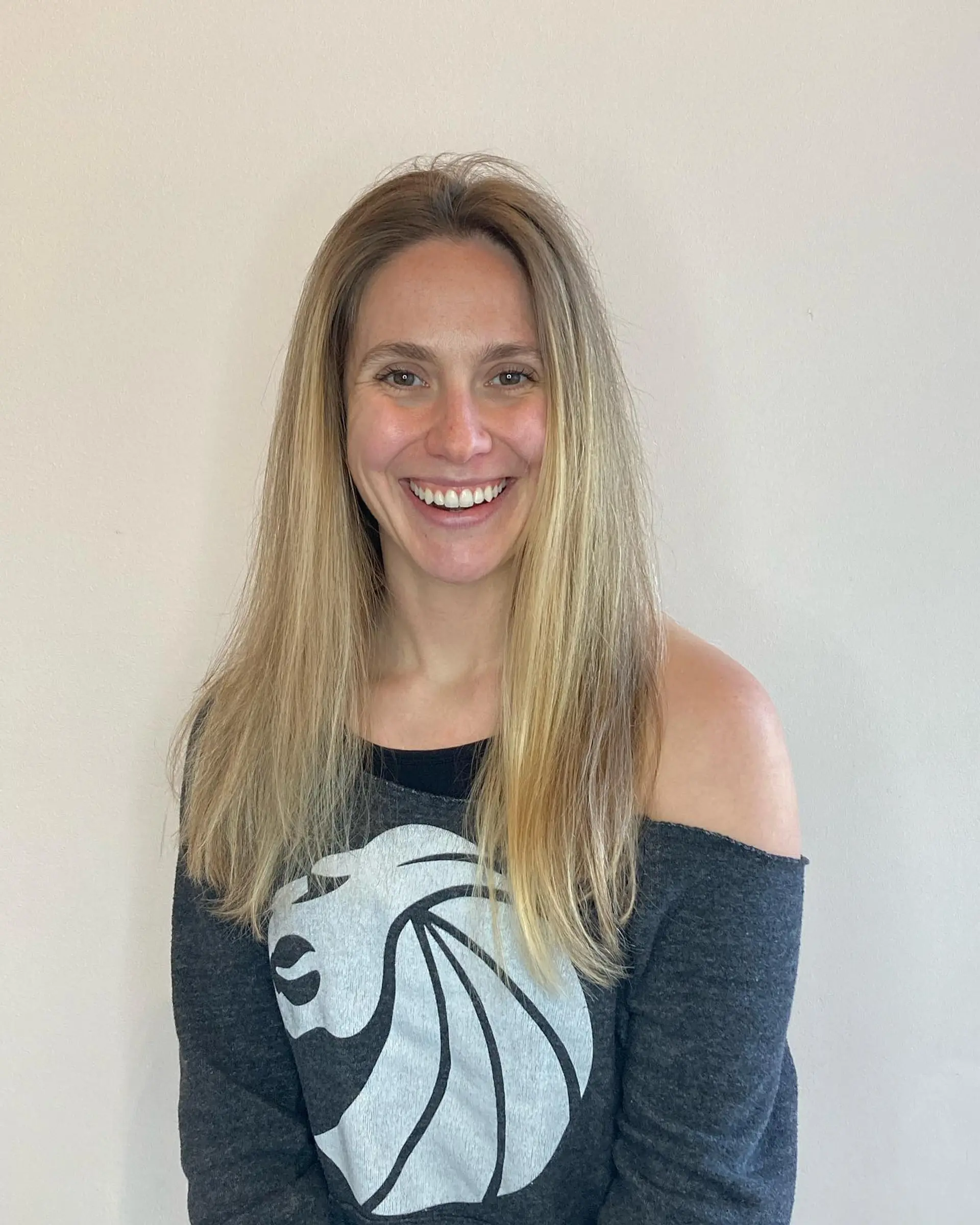 Long, straight hair featuring a lived-in blonde balayage with seamless dimension from darker roots to light blonde ends. 1