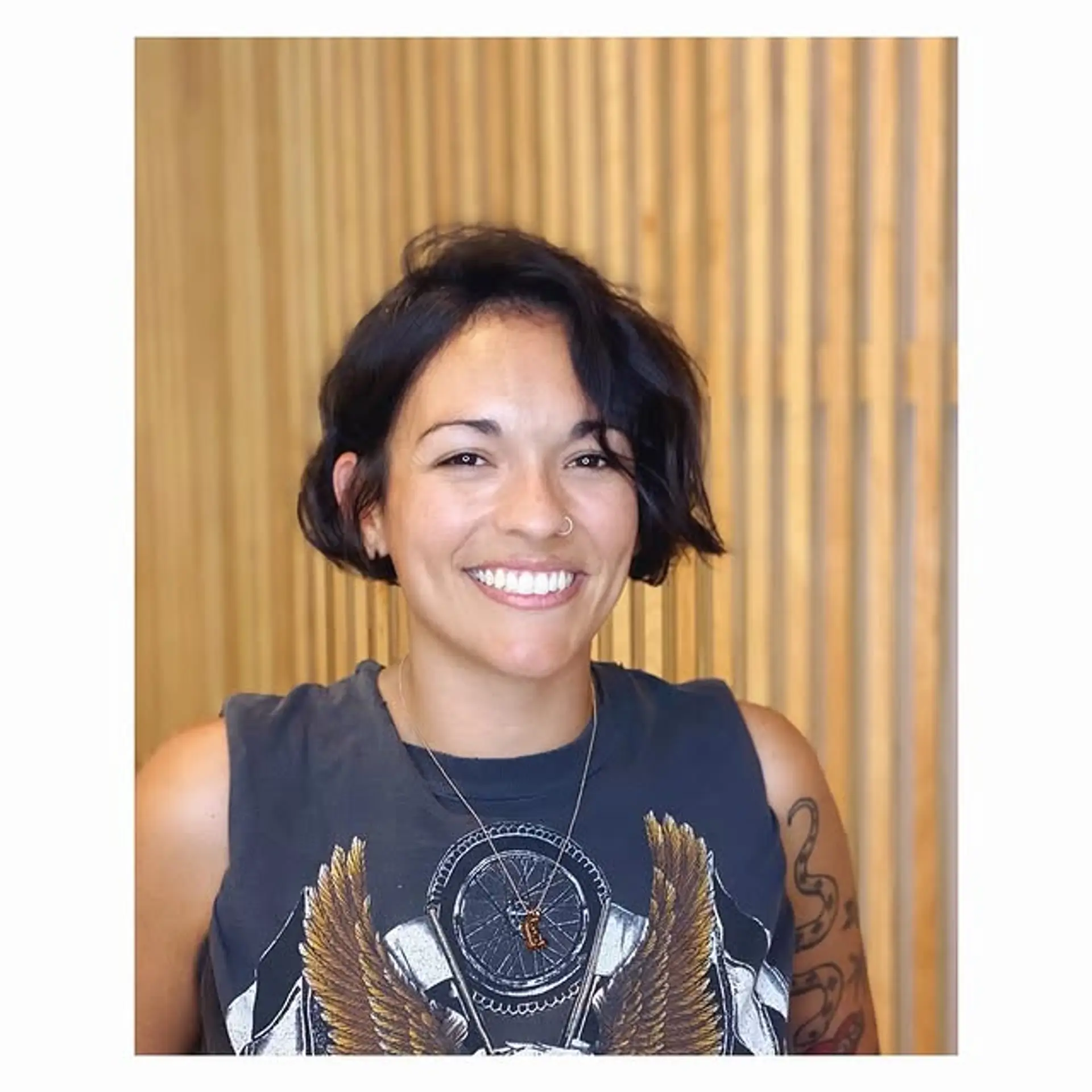 A modern, wavy bob with an asymmetrical cut and textured ends. 1