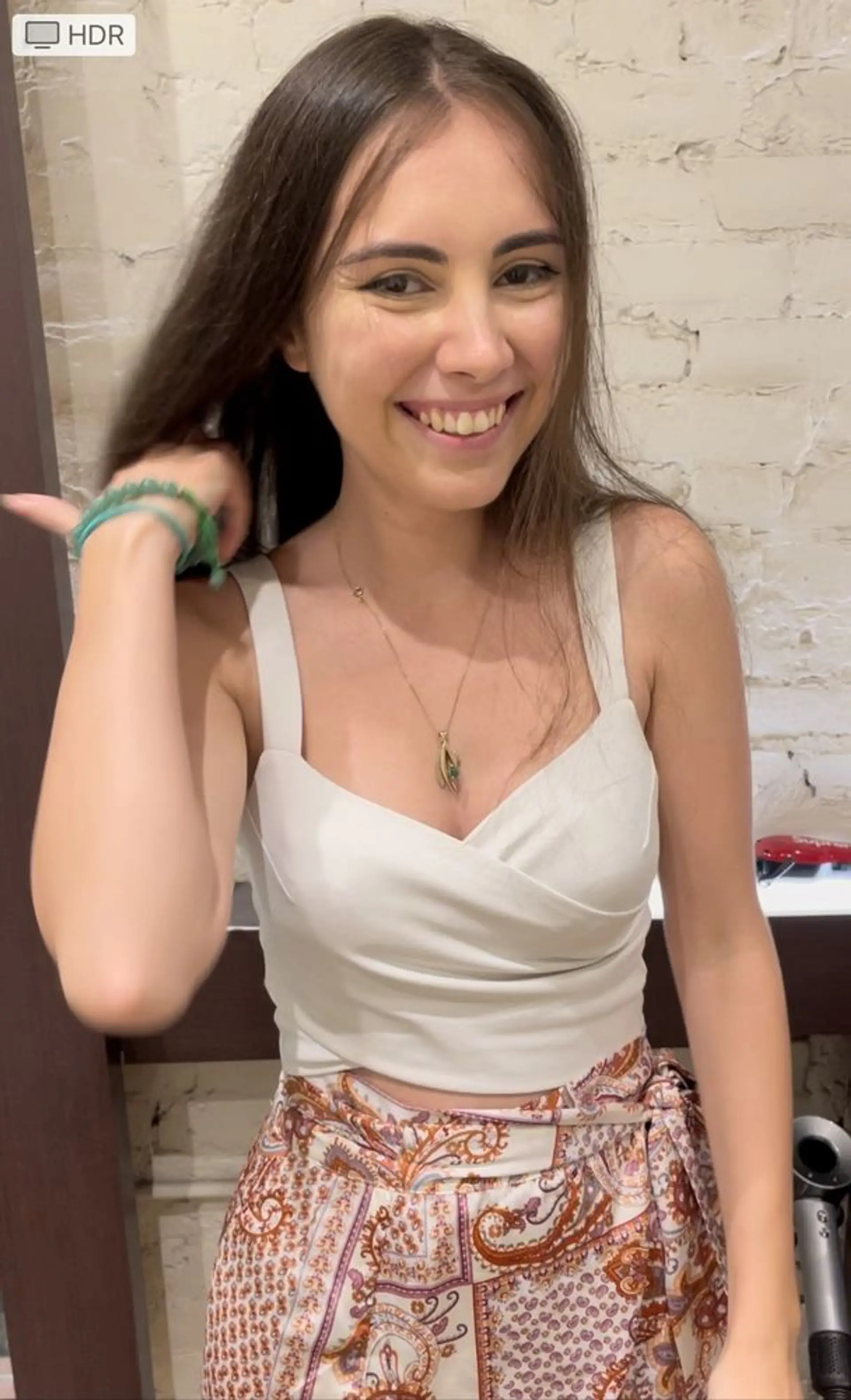 Long, straight hairstyle with subtle layers. 1