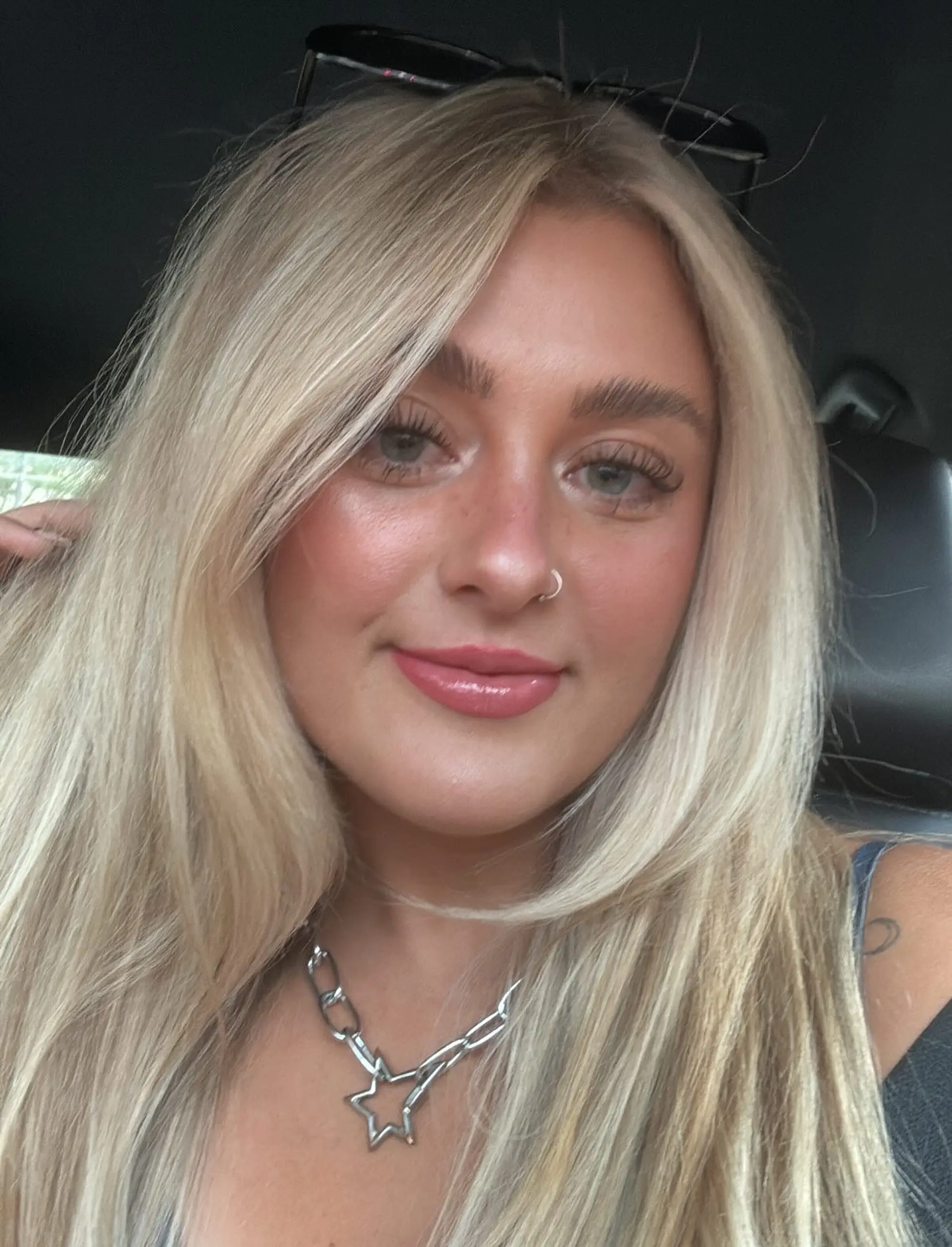 A long, layered hairstyle with face-framing bardot bangs. 1