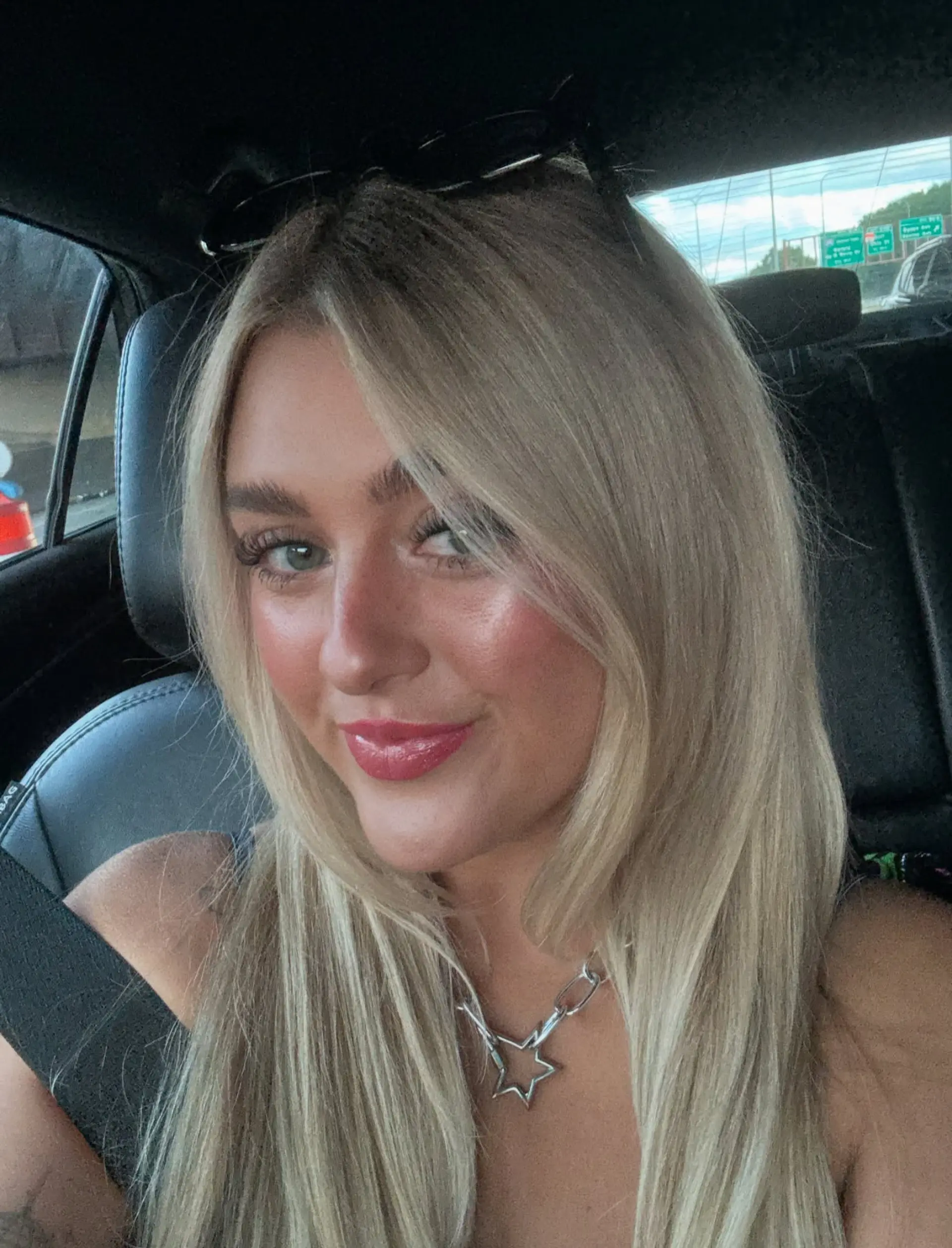 A long, layered hairstyle with face-framing bardot bangs. 3