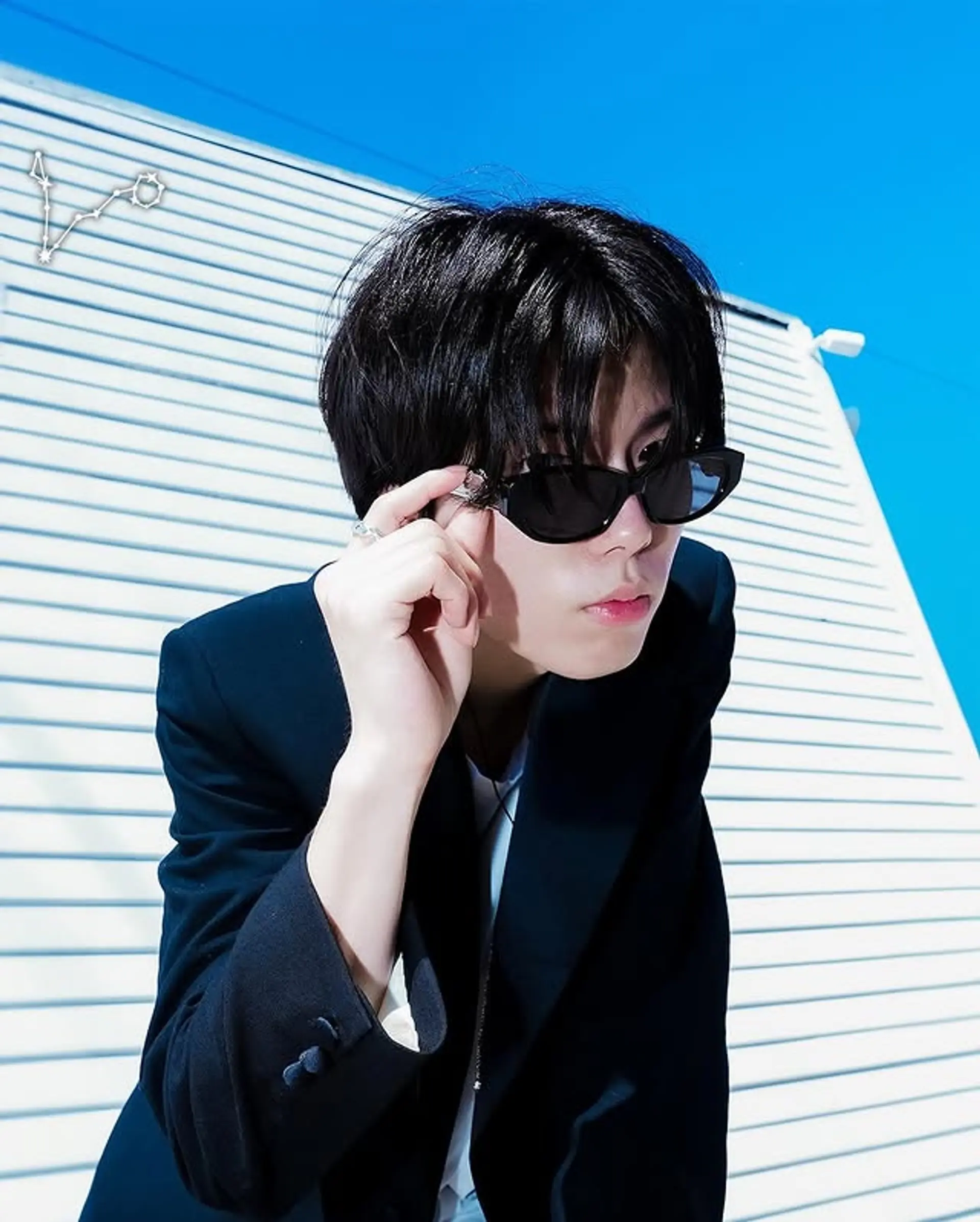 A shaggy bowl cut with textured layers for a modern, edgy look. 1