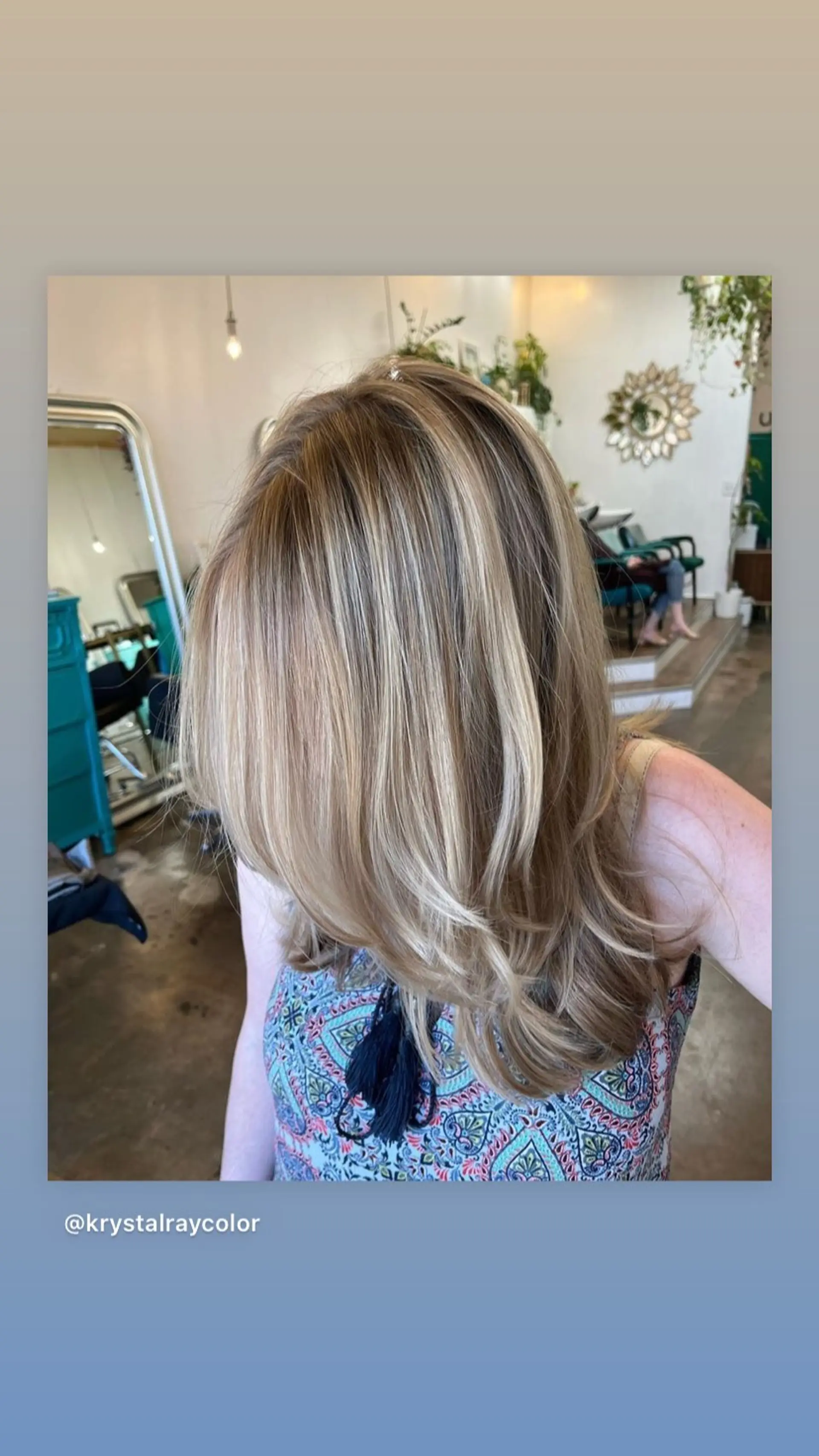 A medium-length layered haircut with face-framing layers, featuring a bronde balayage. 1