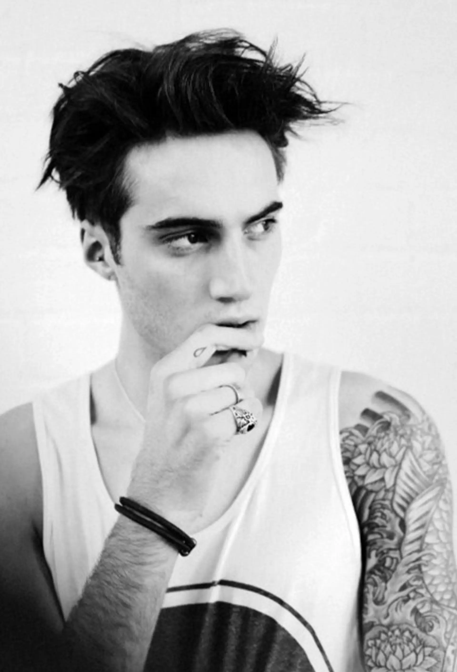 A textured quiff with tapered sides, creating a modern and stylish look. 1