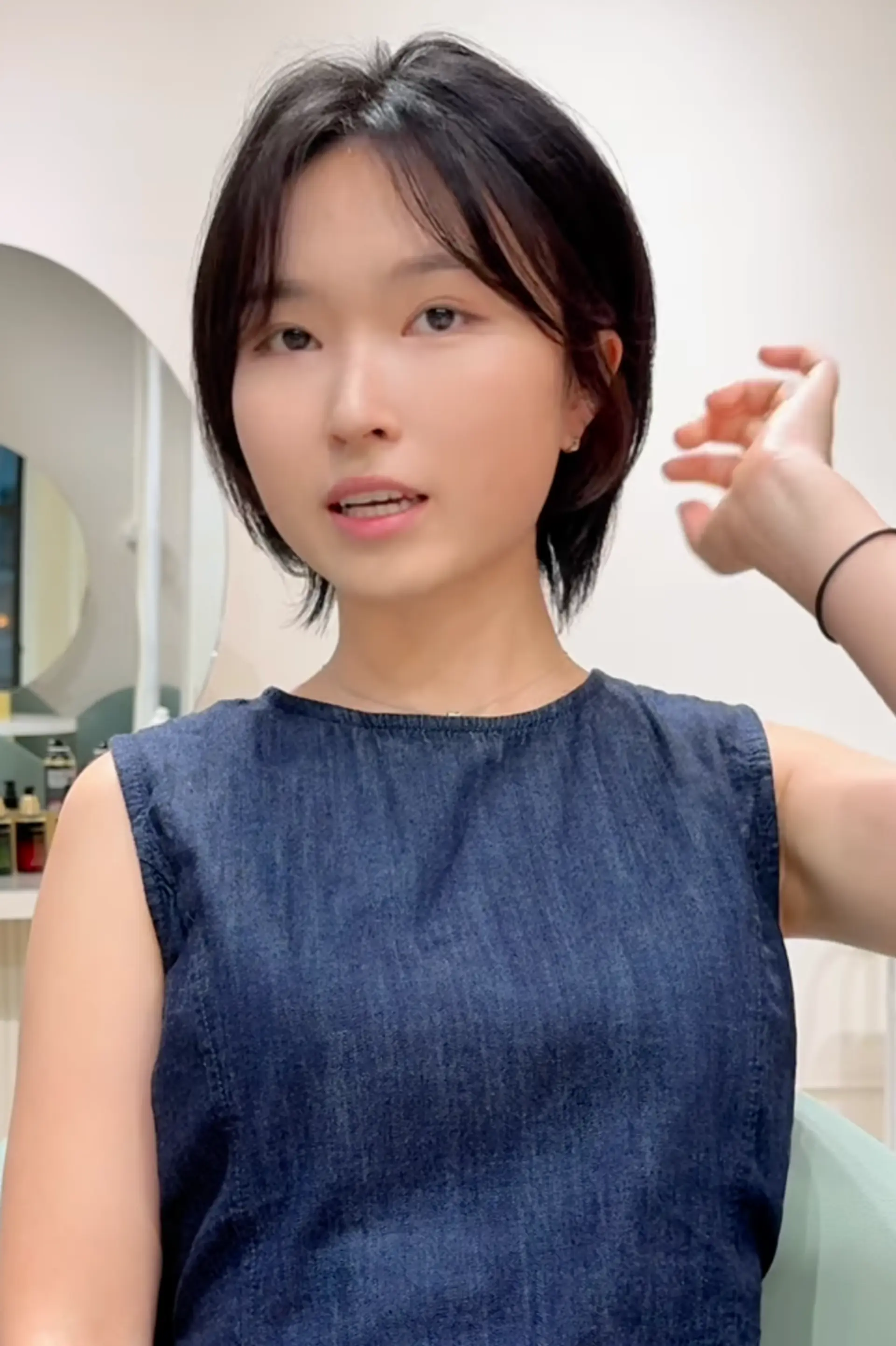 A short, modern feathered bob with straight black hair, featuring layers and a tousled, textured finish.

Stylist: @masaki.newyork 1