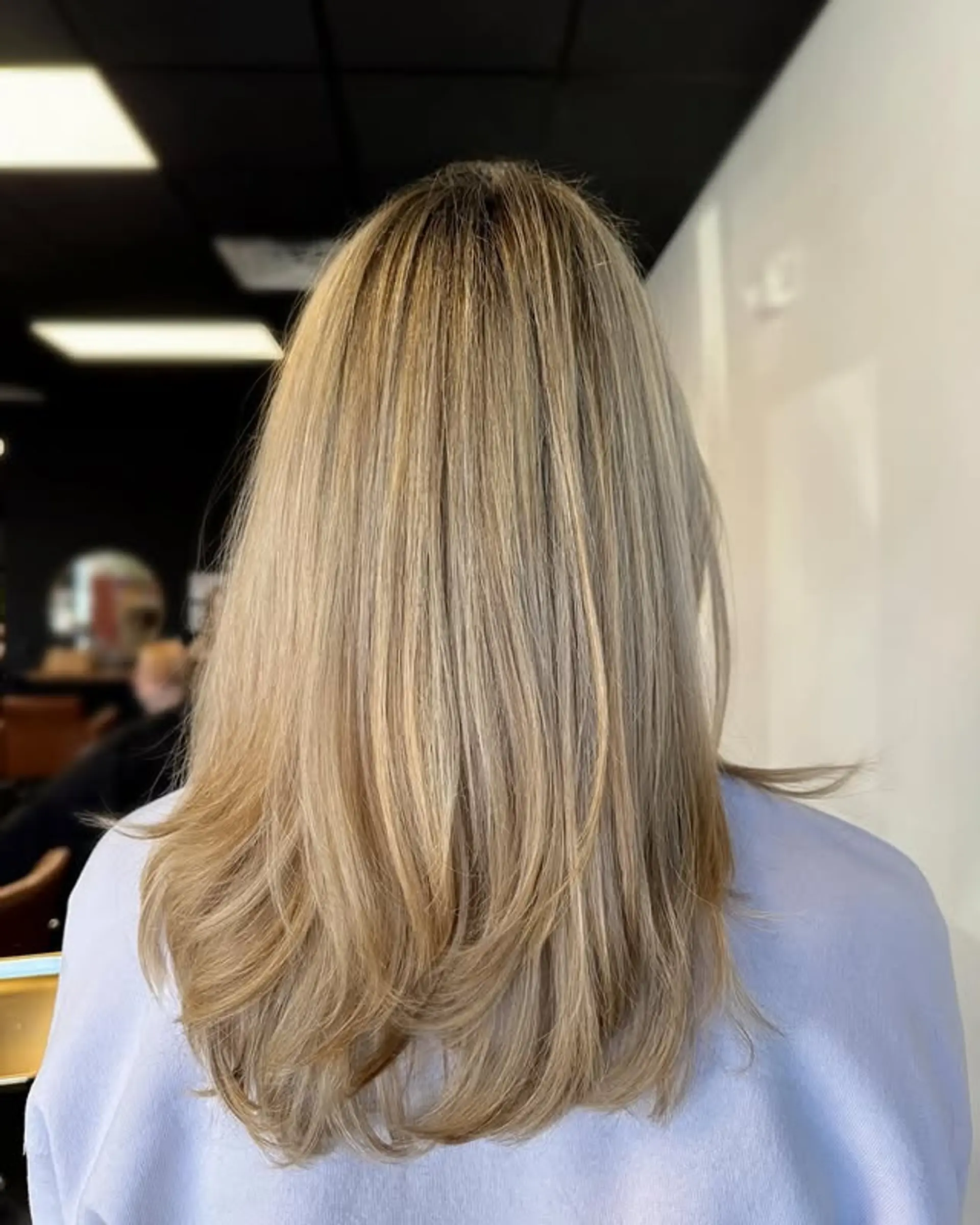 Long layered haircut with beachy waves. 1