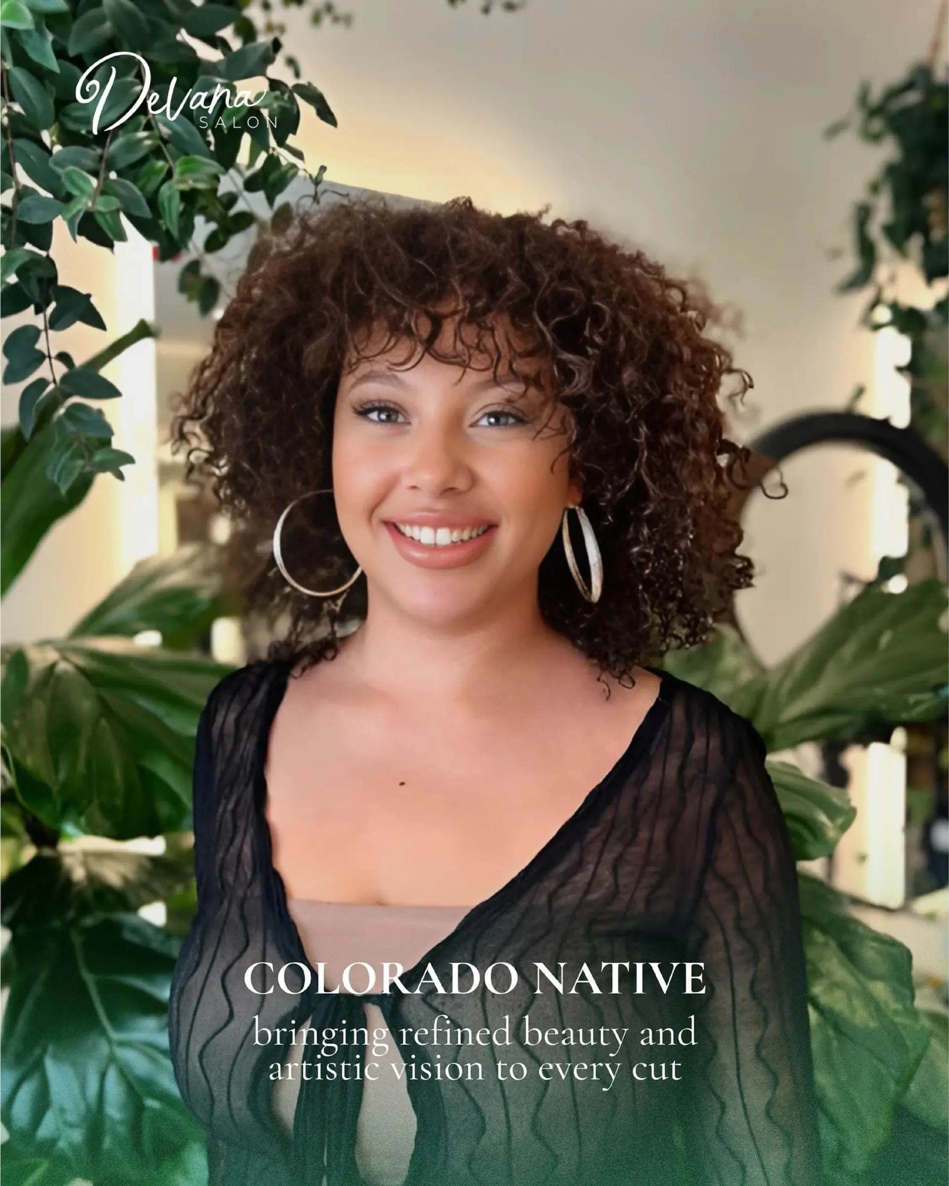 A shoulder-length layered curly hairstyle featuring bouncy, defined curls and textured curly bangs. 1