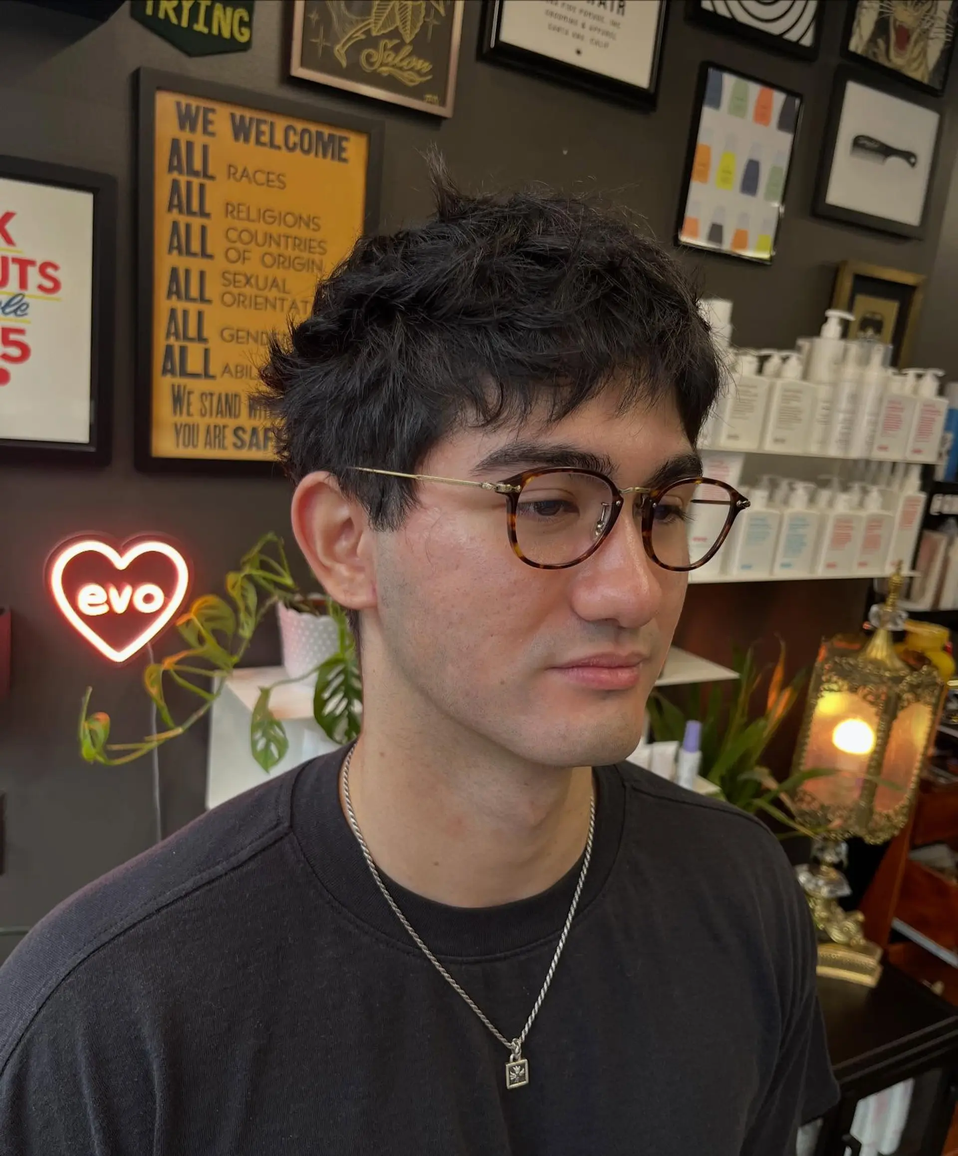 A short, piecey textured crop with soft micro bangs and natural volume. 1