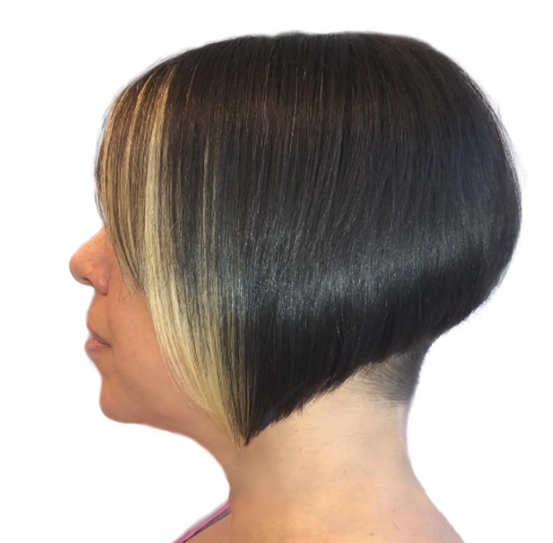 A sharp, A-line inverted bob with an undercut at the nape and peekaboo highlights at the front. 1