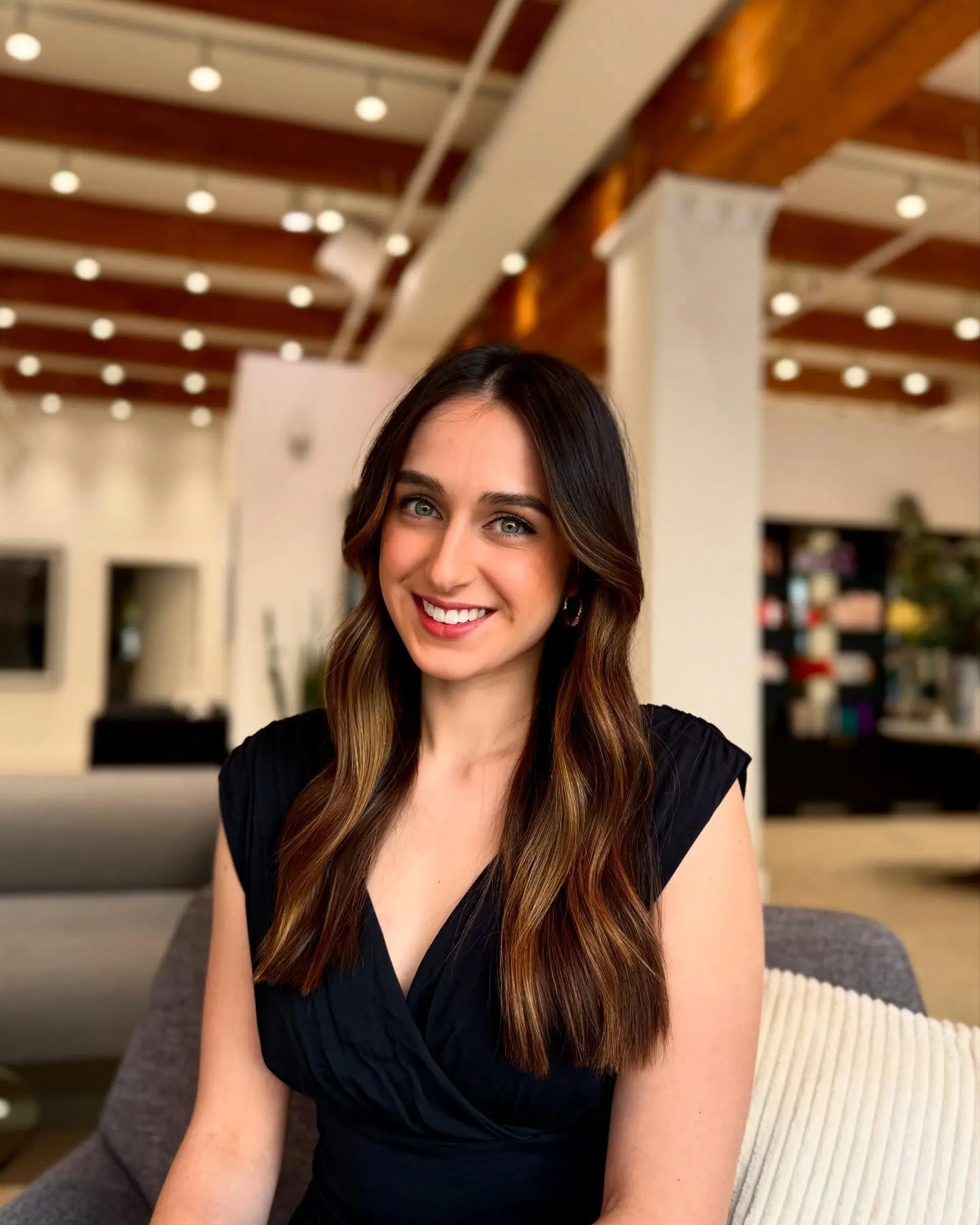 Long, layered wavy hair with a caramel balayage. 1