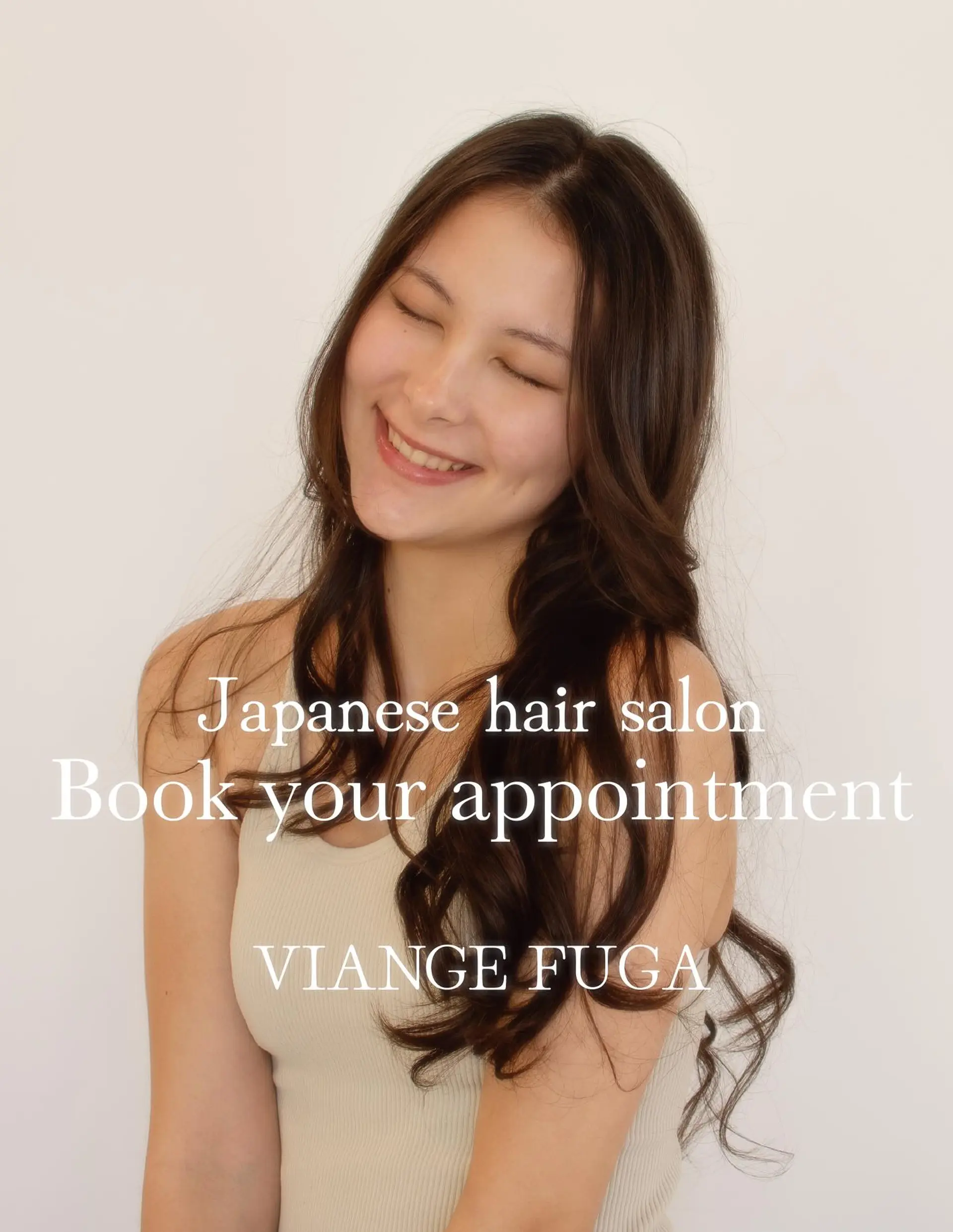 Long dark brown hair styled with loose, flowing waves and natural shine. 1