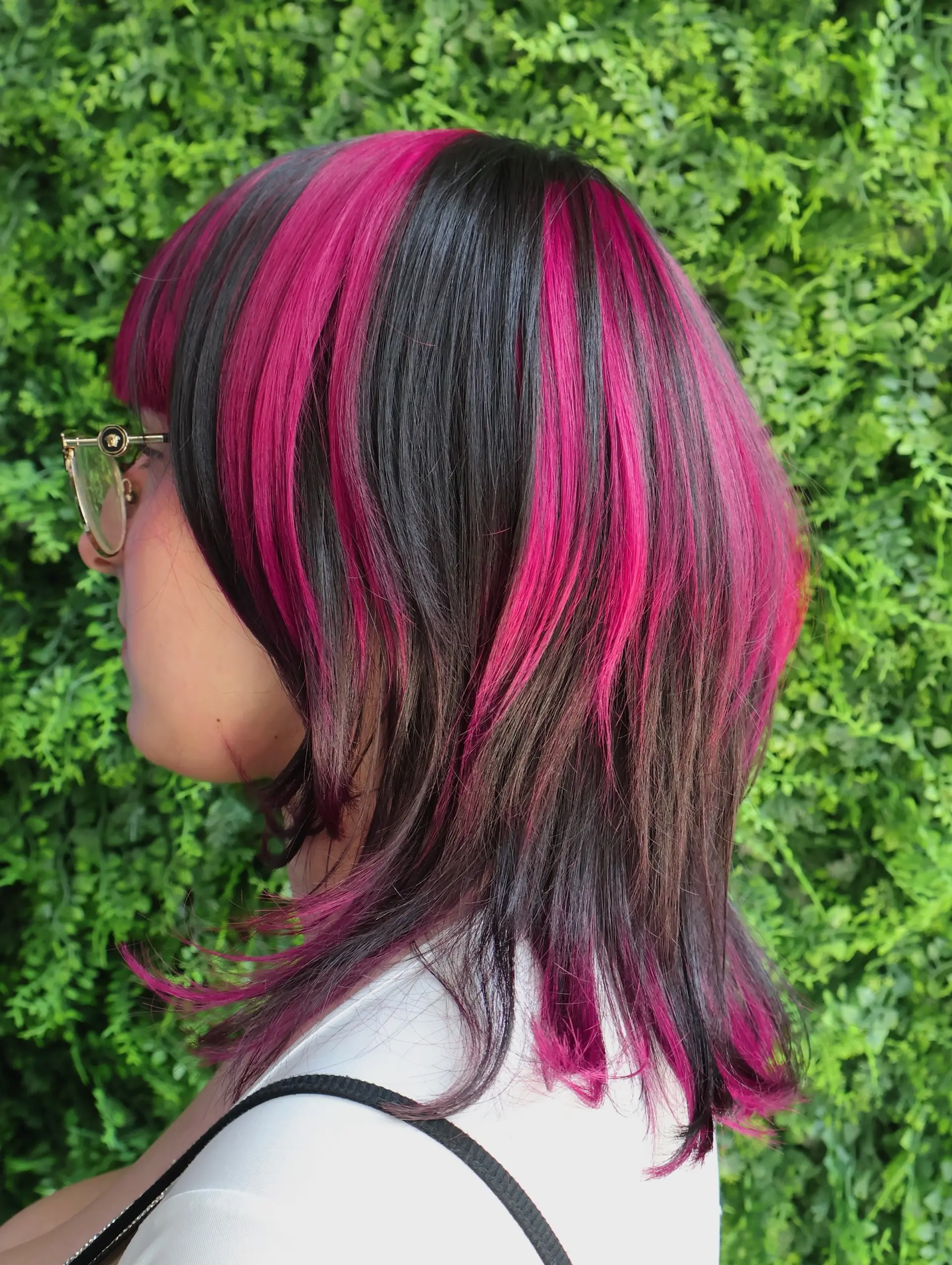 A bob with magenta streaks. 2