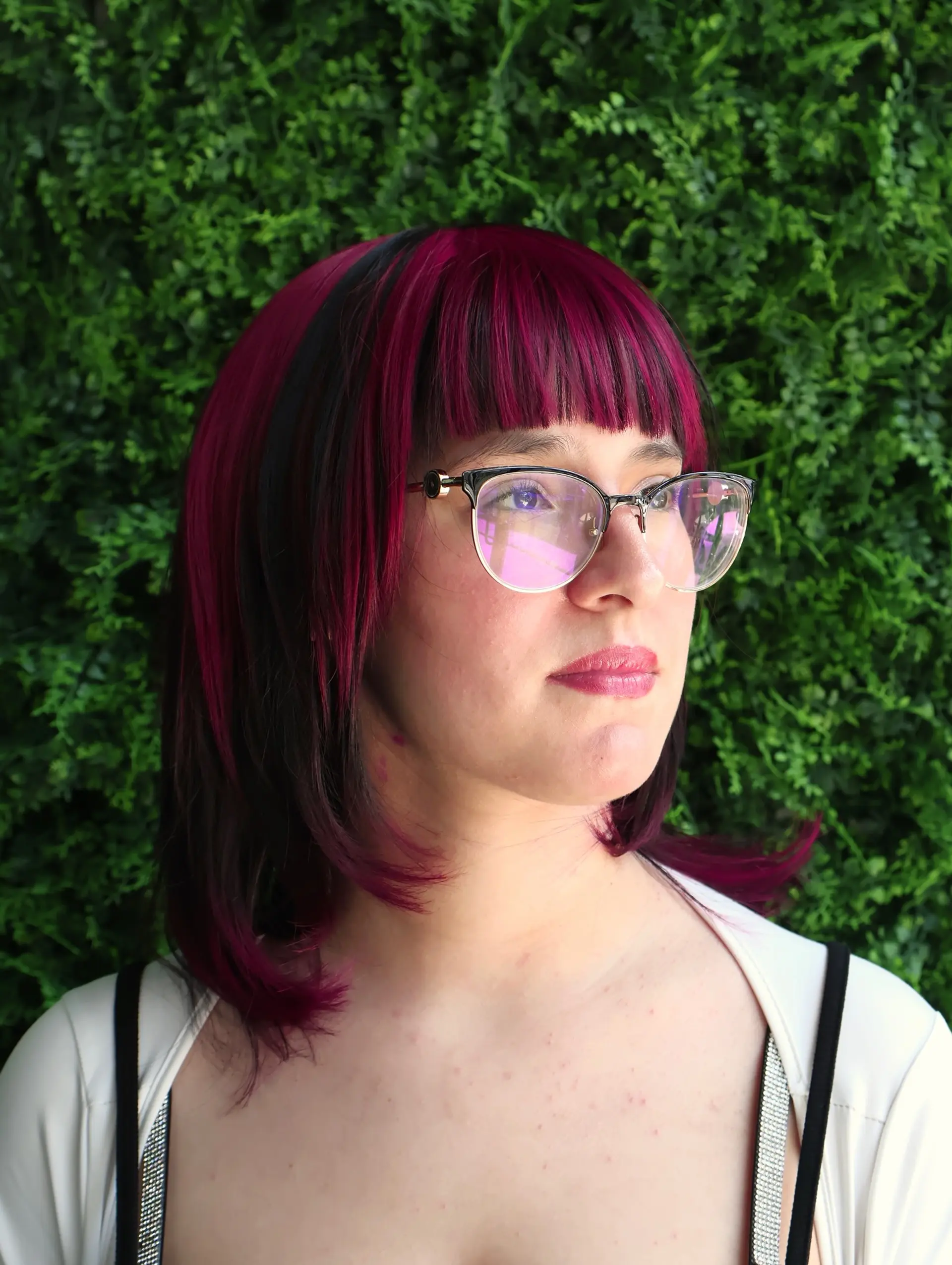 A bob with magenta streaks. 4