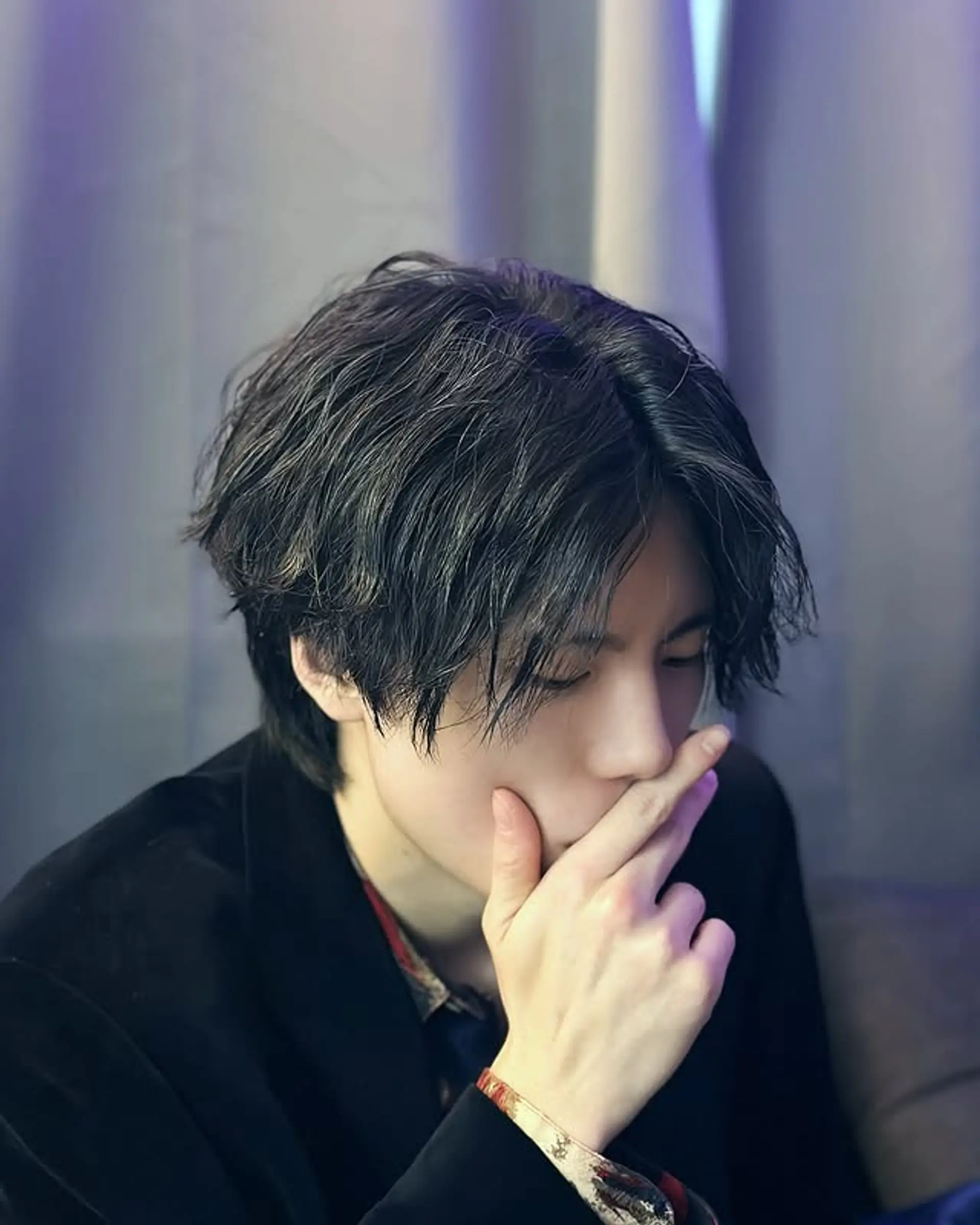 This medium-length hairstyle features soft layered ends with tousled style. 1