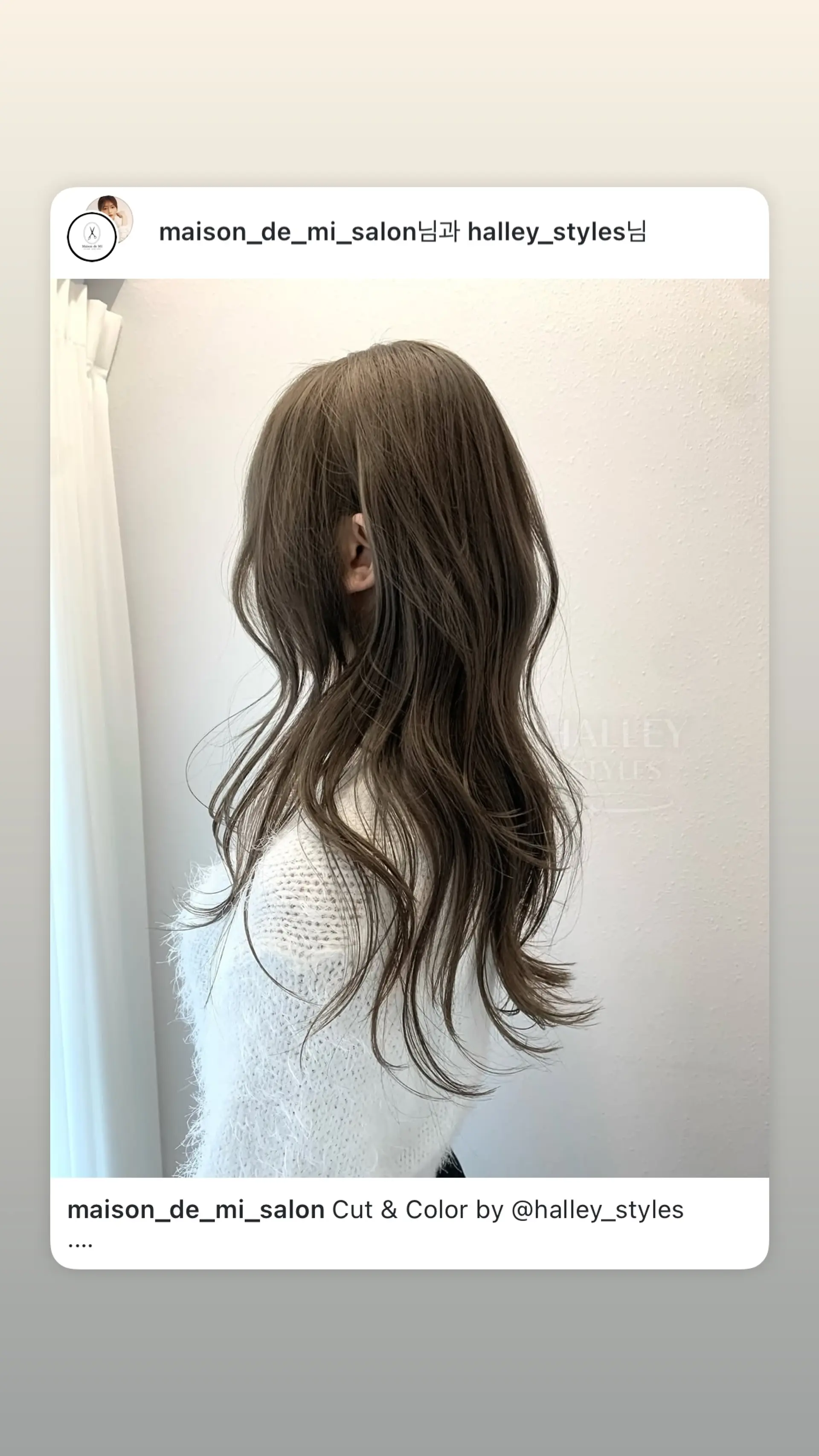 A long, wavy hairstyle with soft layers and face-framing. 1