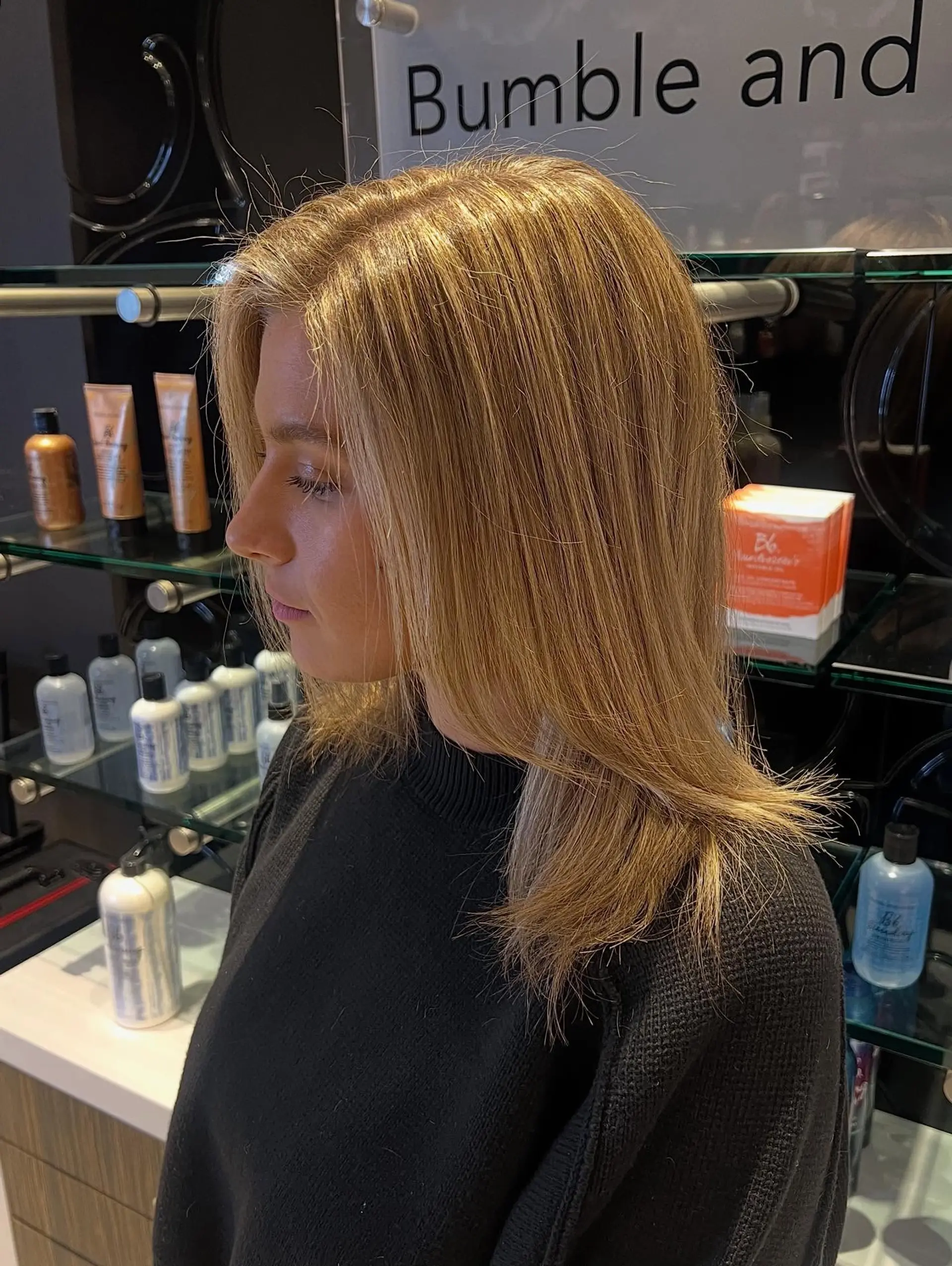 Medium-length straight hair featuring warm, multi-dimensional golden blonde highlights blended into a natural base. 1