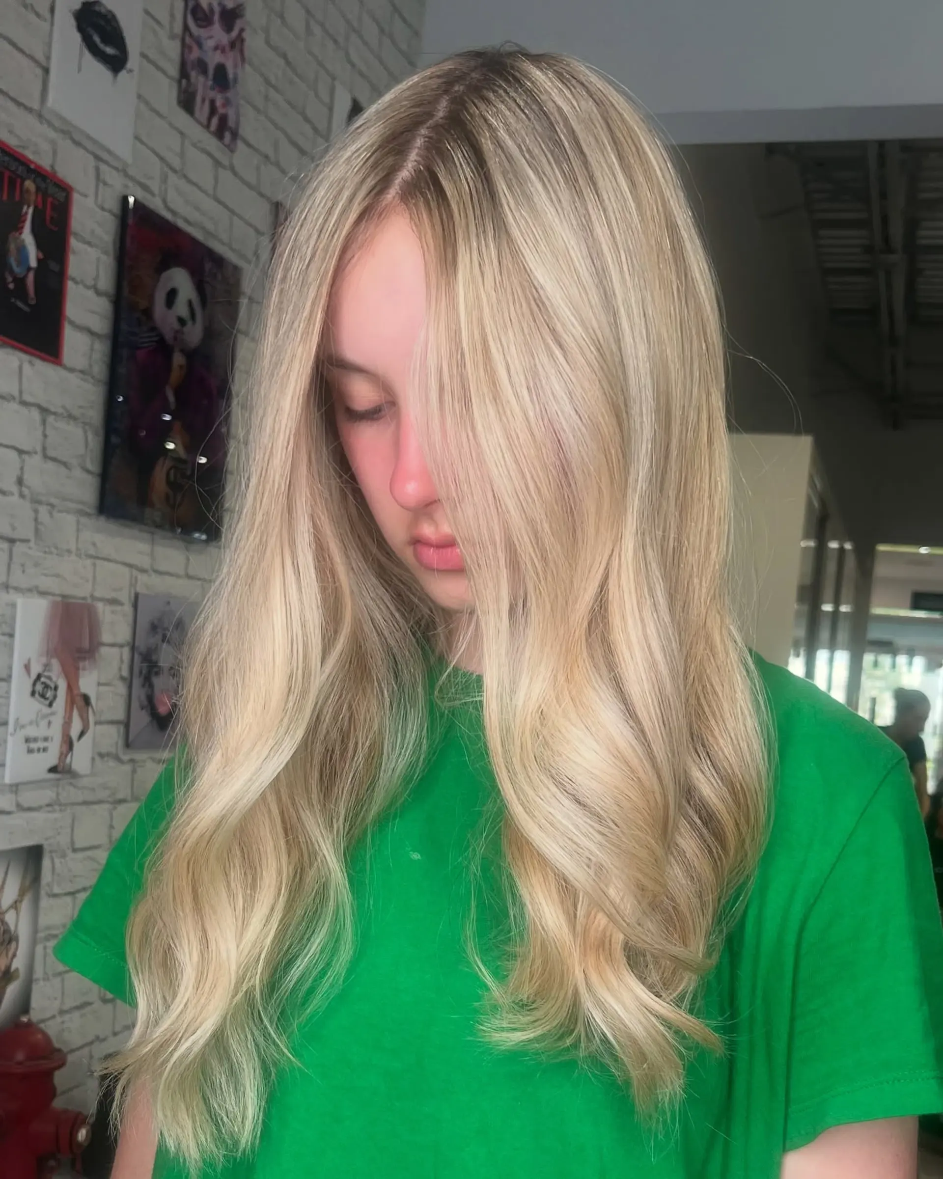 Long, wavy golden blonde hair with natural waves and subtle layers. 1
