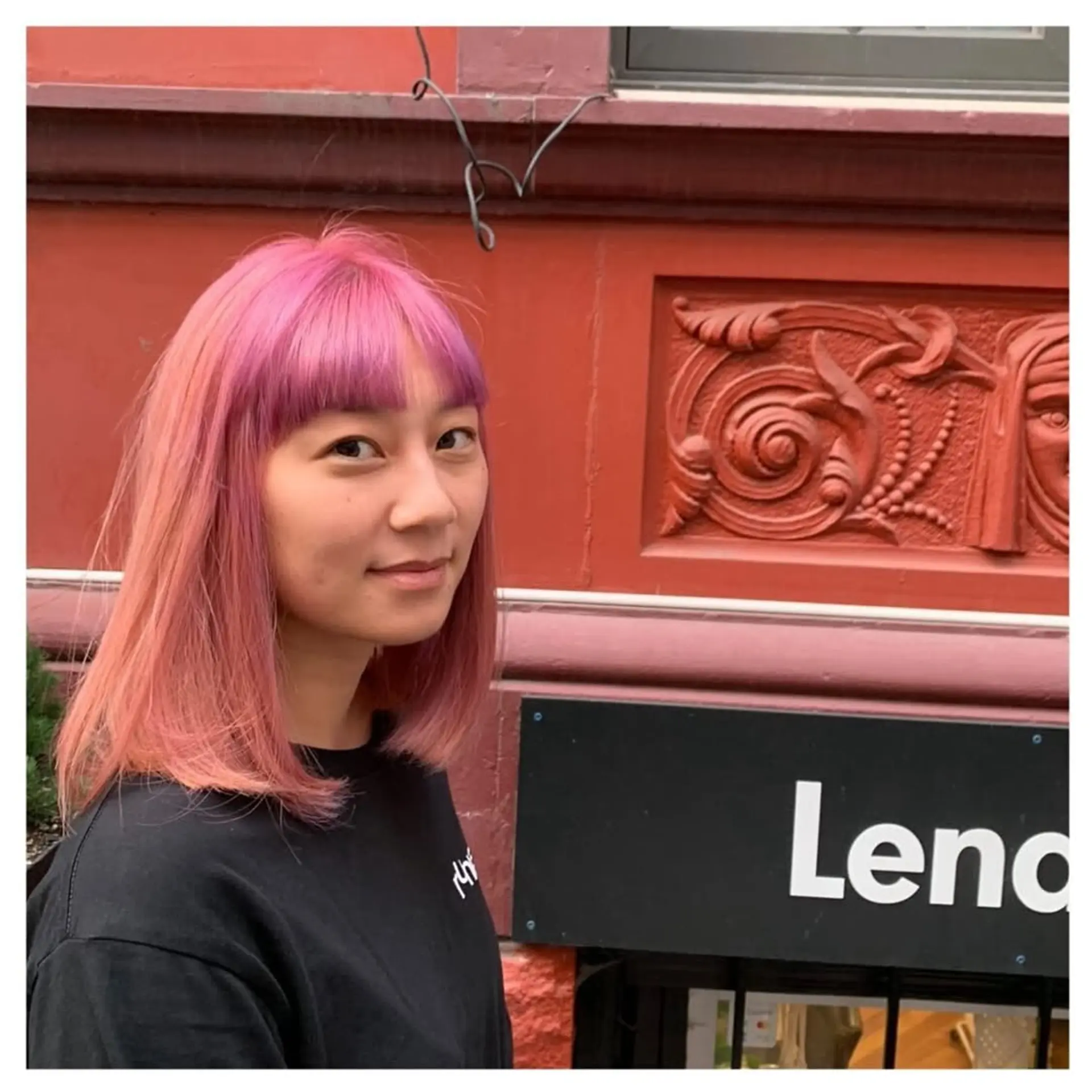 A trendy medium-length blunt bob with vibrant pink ombre color and blunt bangs. 1