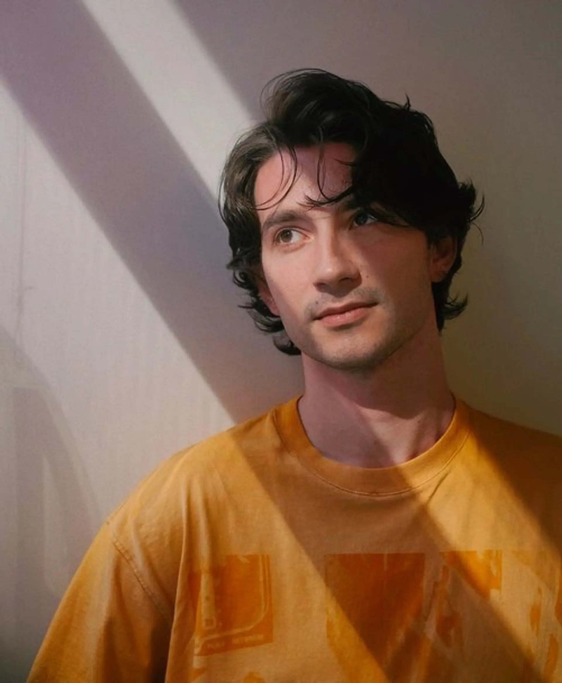 A flowy, layered haircut with medium length hair. 1