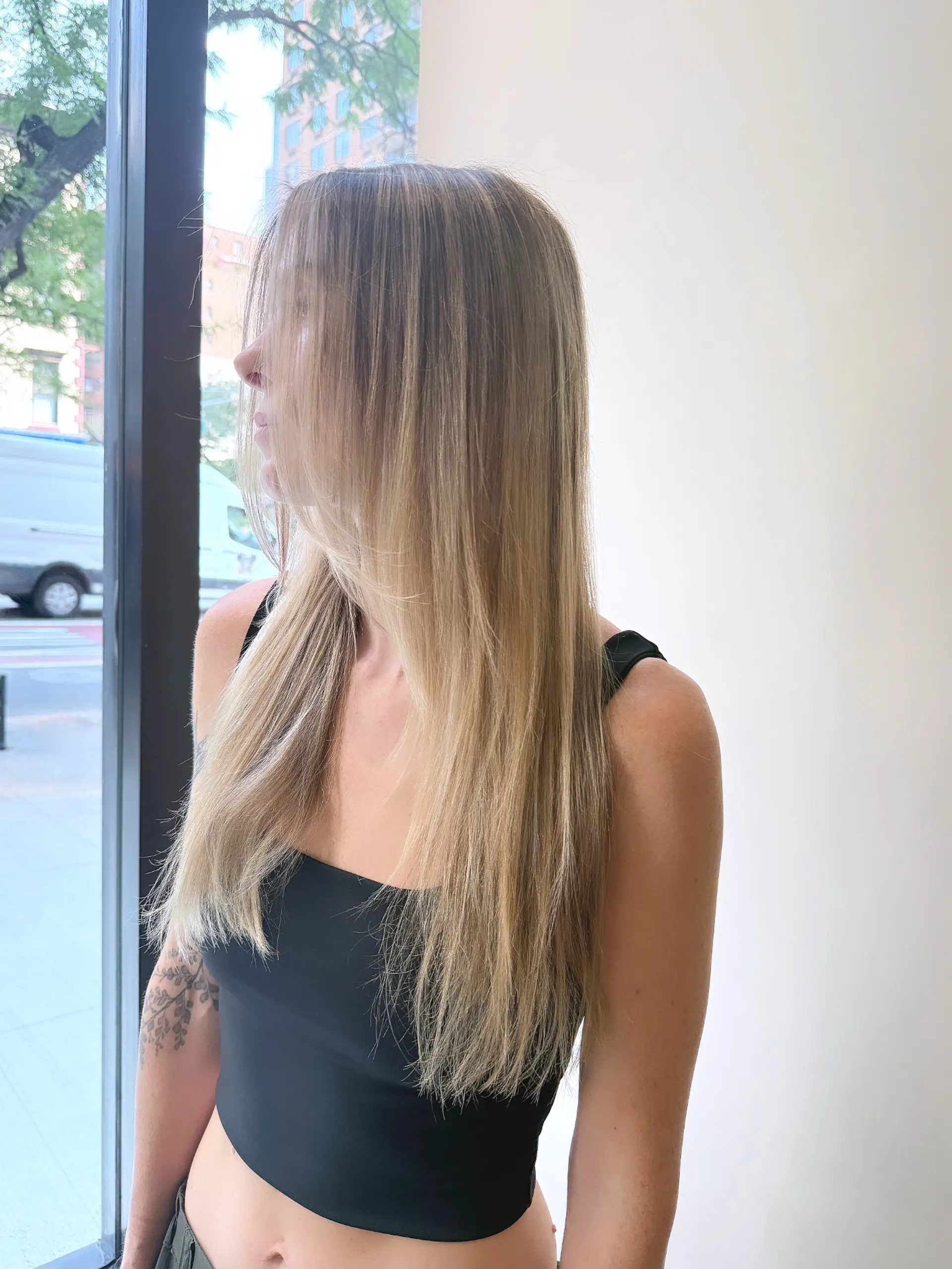 Long, sleek straight hair featuring fine blonde highlights blended into a light brown base with face-framing layers. 1