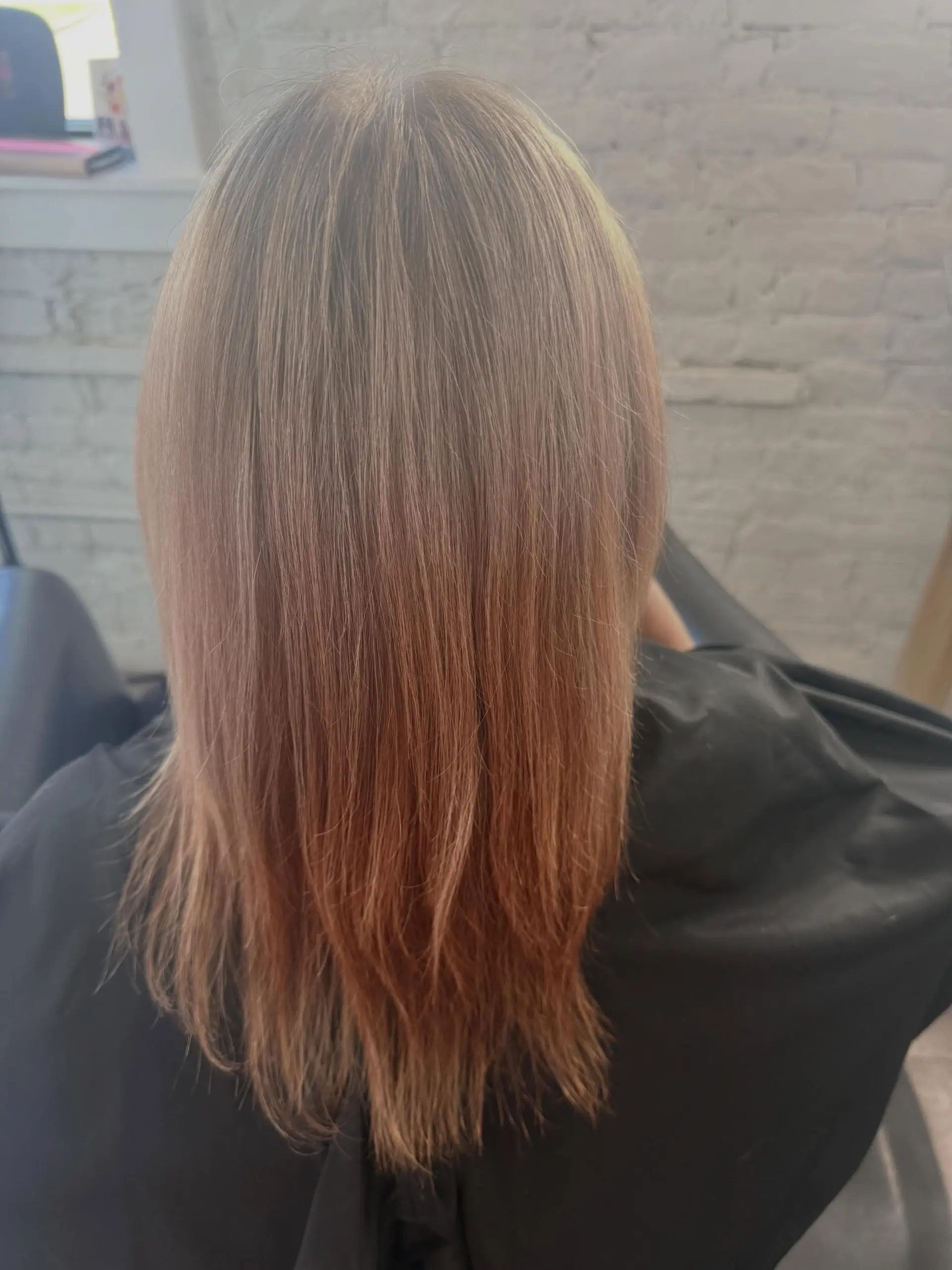Straight, medium-length dirty blonde hair with soft layers and seamless weft extensions blending into natural highlights. 1