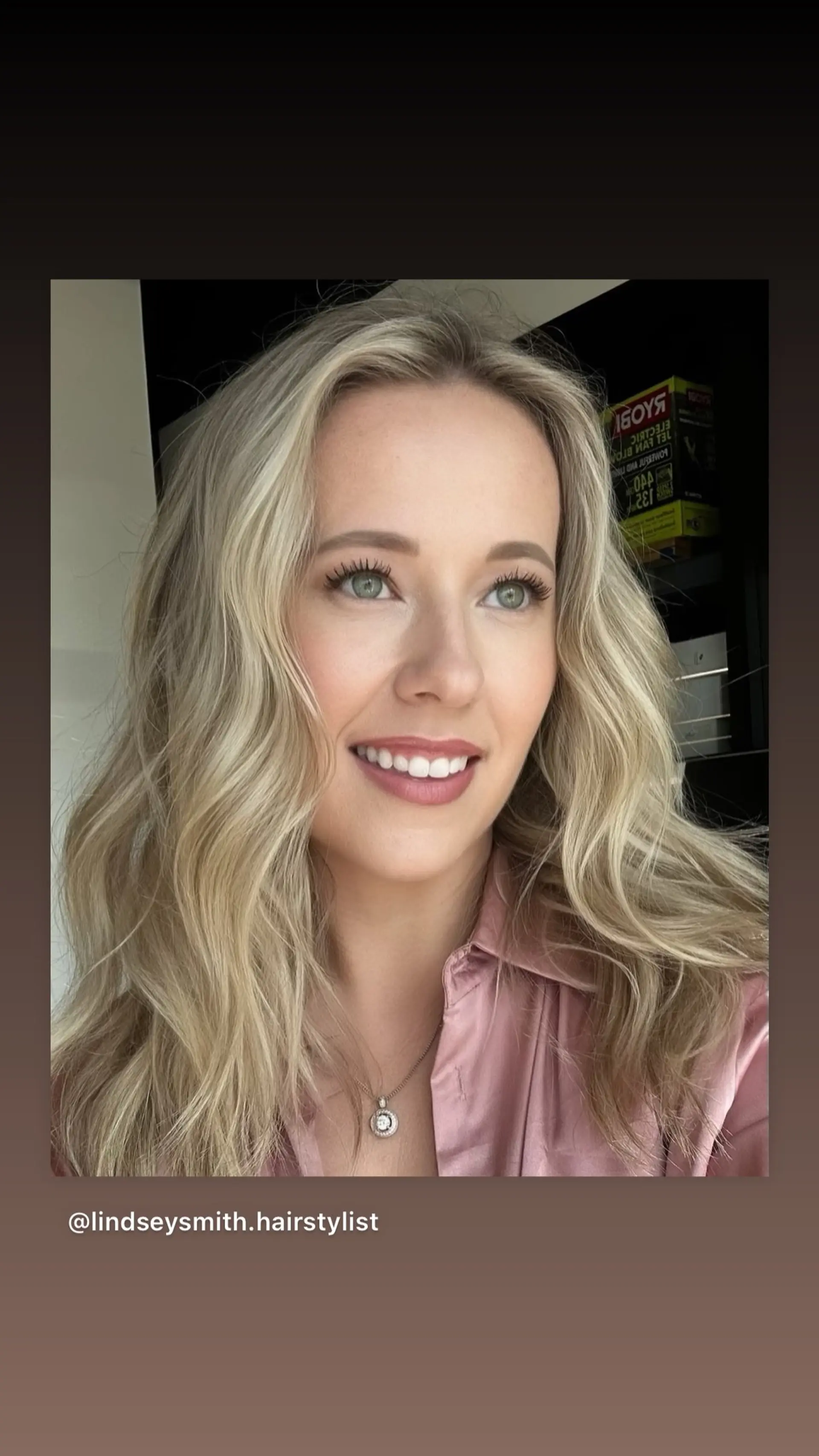 Long blonde hair styled in soft, beachy waves with highlights. 1