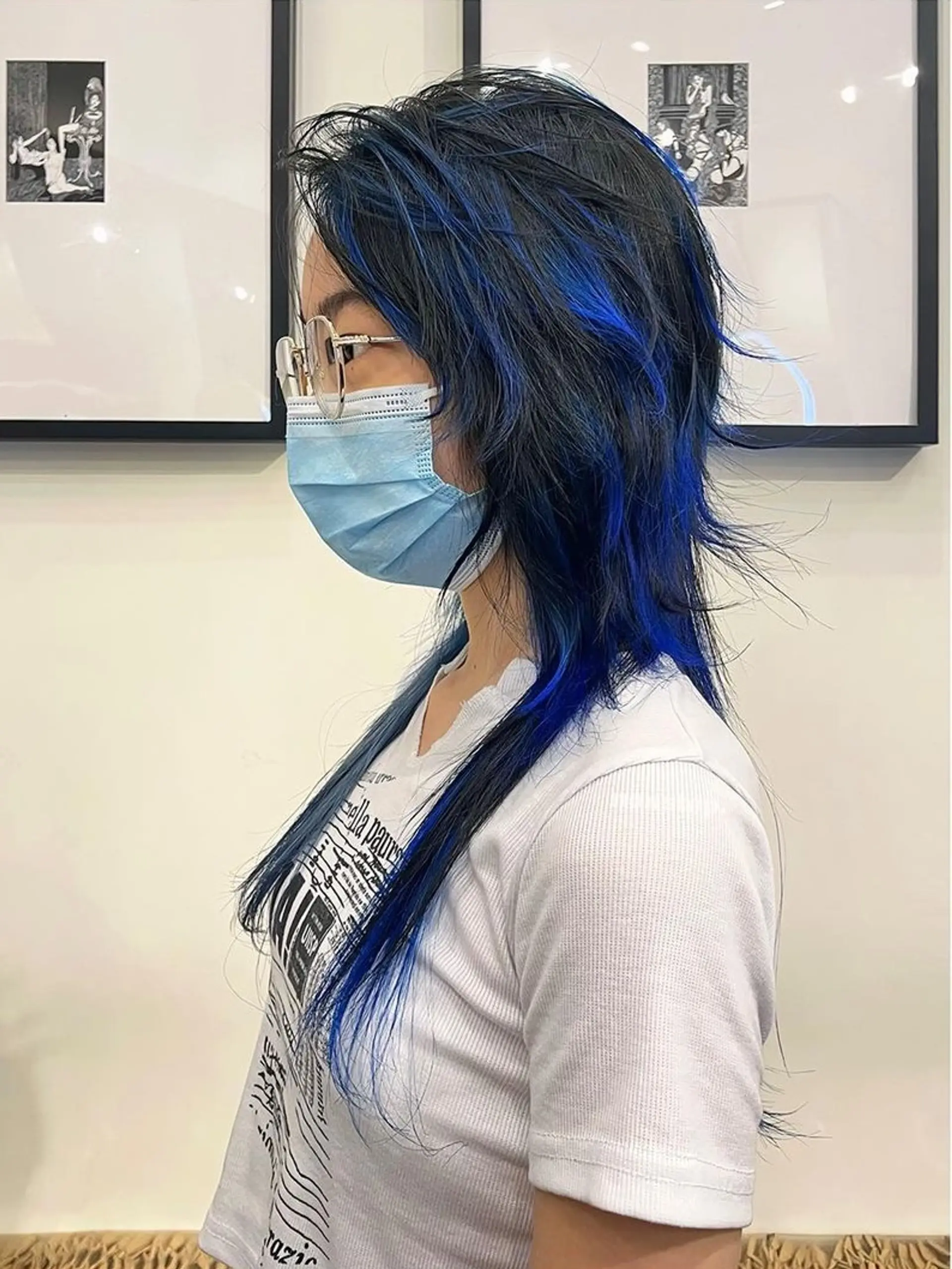 A bold and eye-catching hairstyle featuring long, straight, black hair with vibrant blue highlights. Multiple layers create a shaggy look with a modern mullet style at the back and striking blue highlights for contrast.
🧿 Hair by @v1ce0501 🧿 2