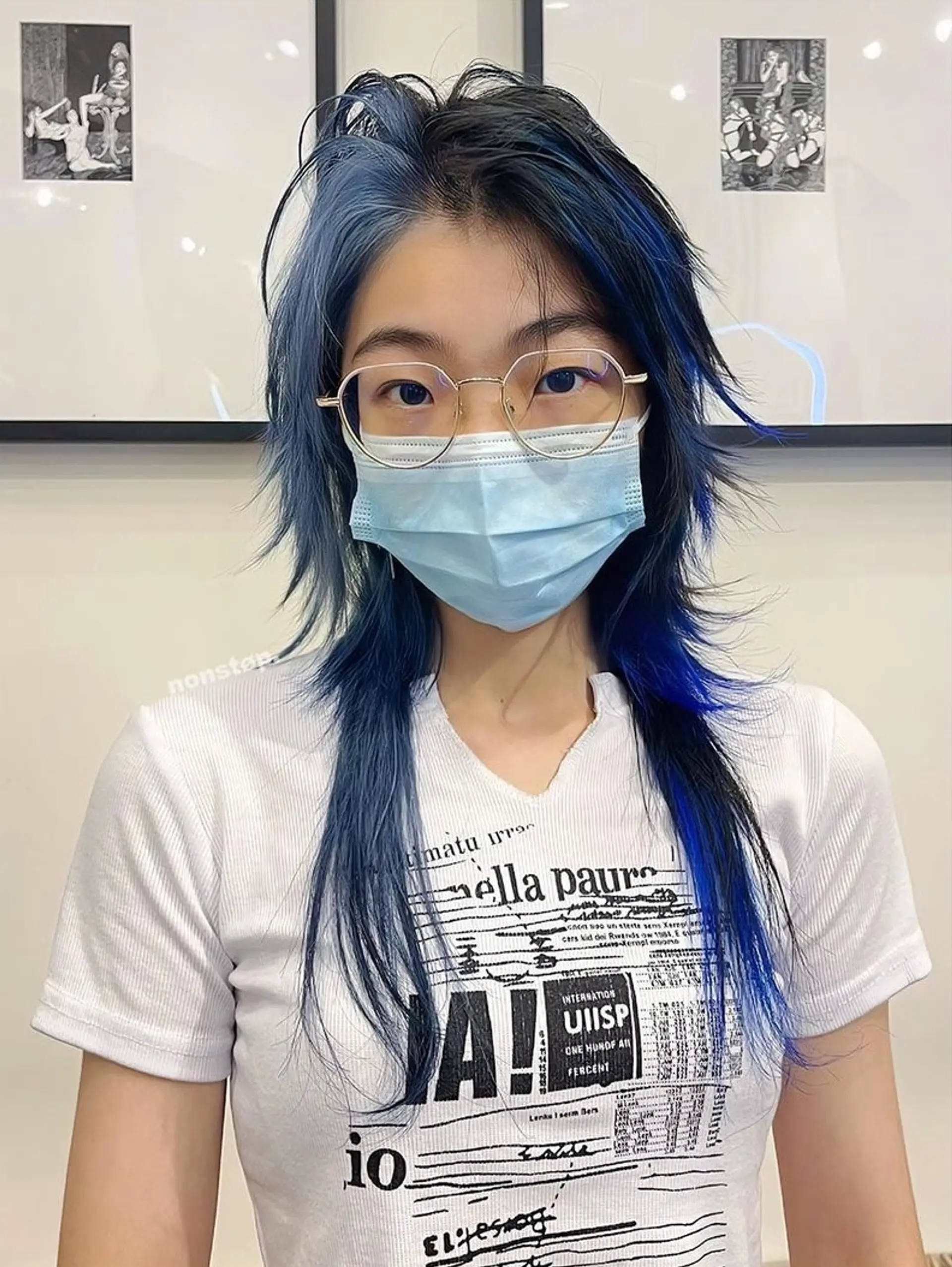 A bold and eye-catching hairstyle featuring long, straight, black hair with vibrant blue highlights. Multiple layers create a shaggy look with a modern mullet style at the back and striking blue highlights for contrast.
🧿 Hair by @v1ce0501 🧿 1