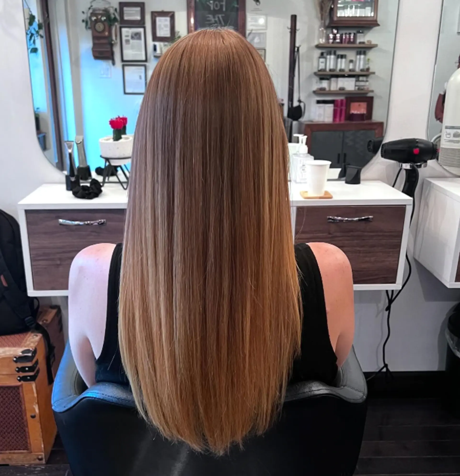 A long, straight bronde hairstyle with subtle layers. 1