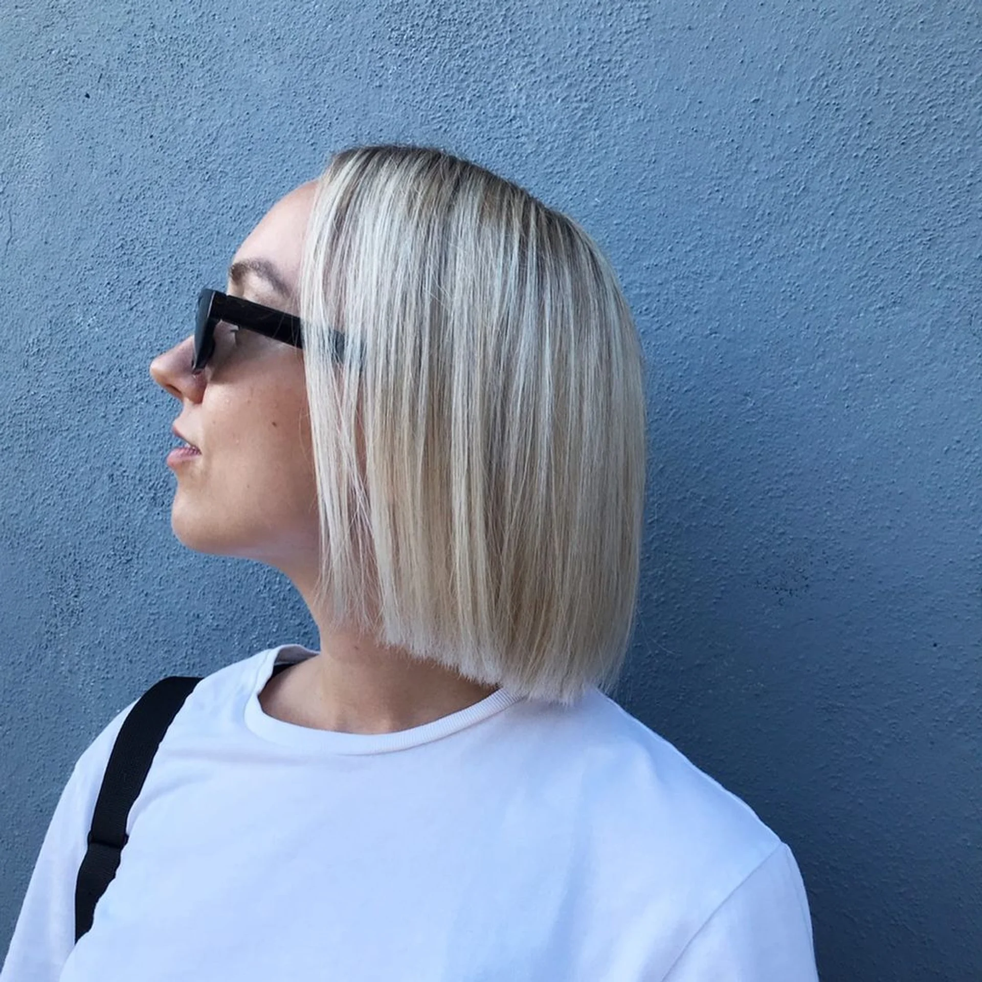 A sleek, side-parted chin bob showcasing the reflective Liquid Contour Bob trend - Preview 3