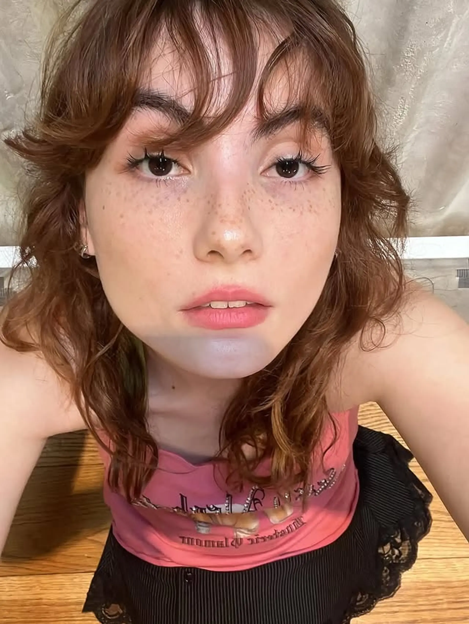 A modern shag with face-framing layers and curtain bangs. 1