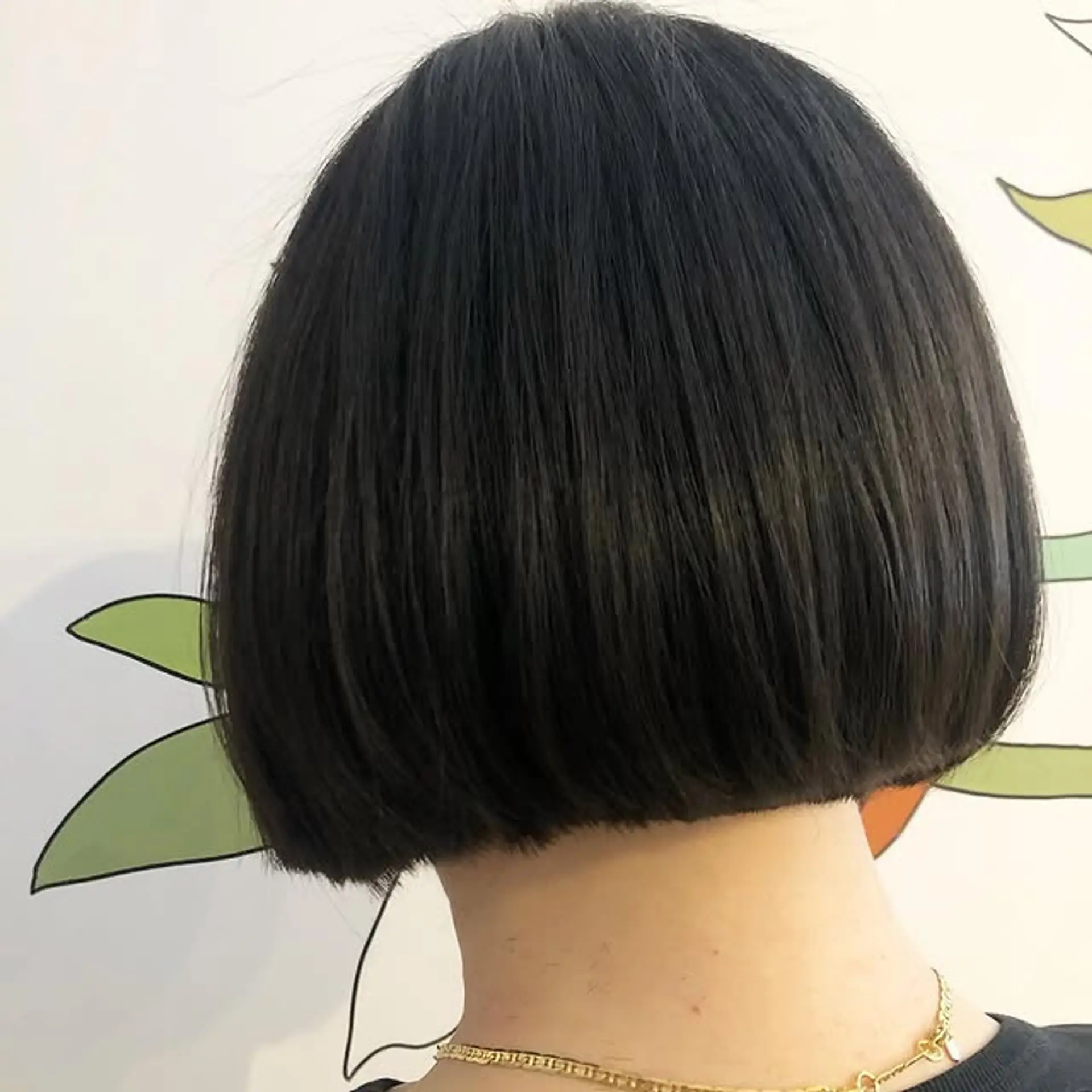 A chin-length bob with a blunt, even cut. 1